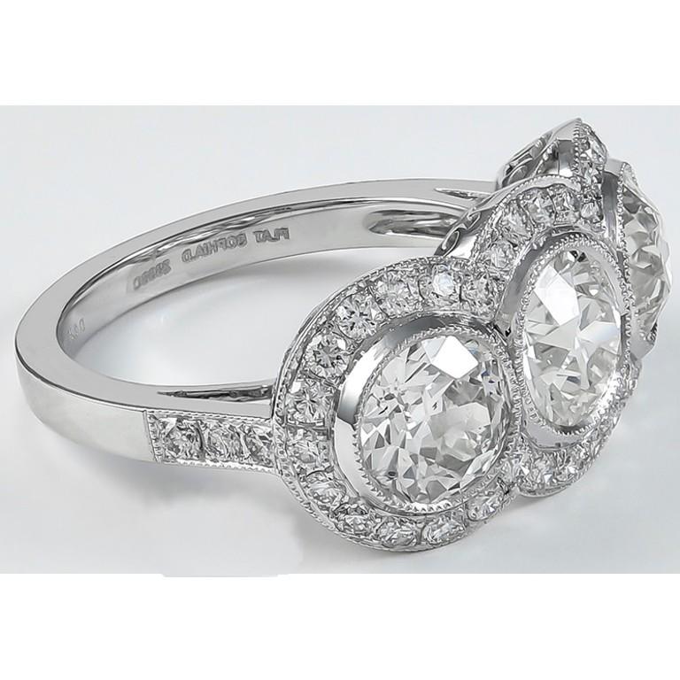 Three stone platinum ring with 1.11 carat center stone with 0.65 carat and 0.75 carat stone n both side accentuated with 0.59 carat small diamonds. 

Sophia D by Joseph Dardashti LTD has been known worldwide for 35 years and are inspired by classic