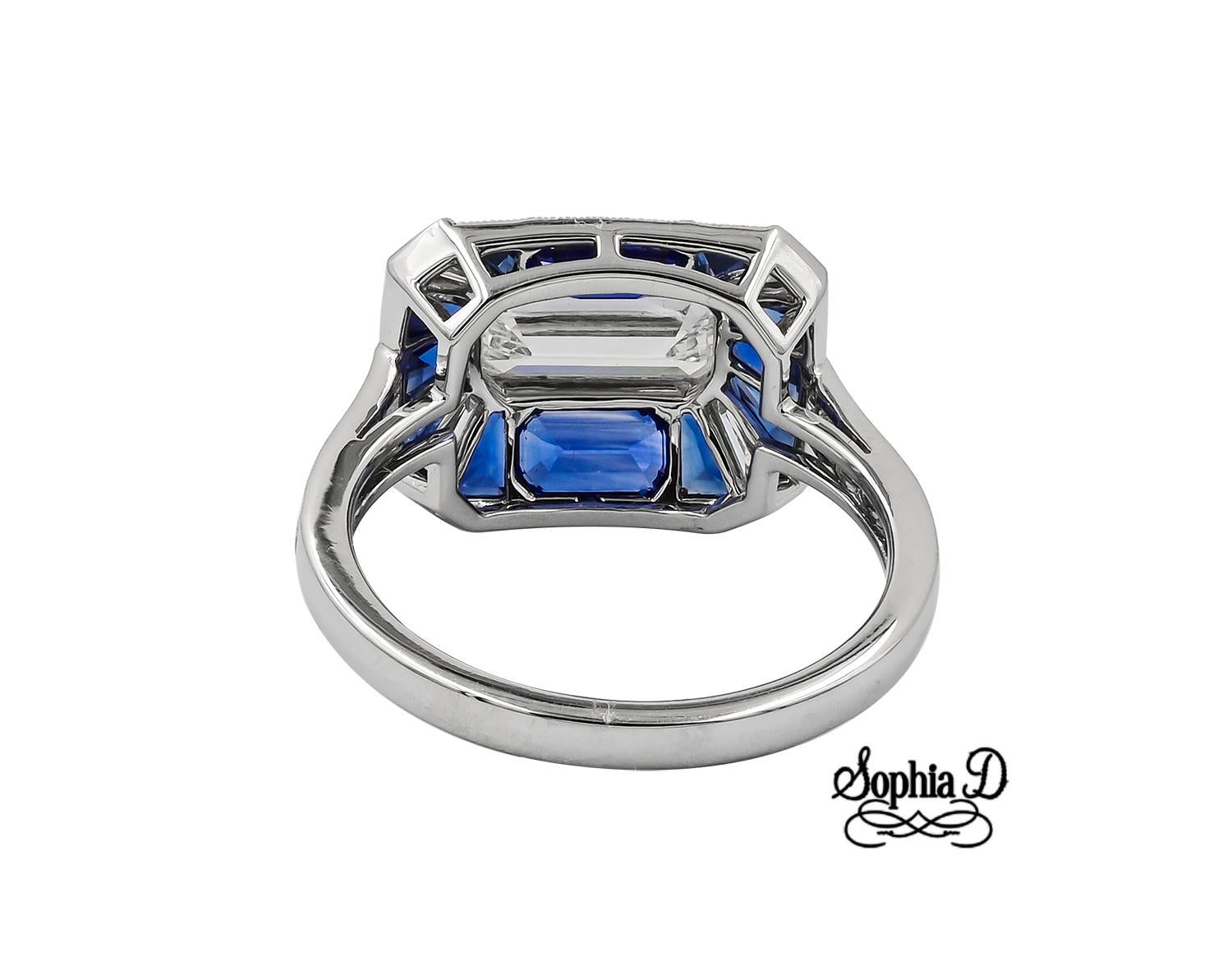 Bague centrale en diamant baguette Sophia D de 1,30 carat, sertie en platine et rehaussée de diamants de 0,69 carat et de saphirs bleus de 1,87 carat.

La taille est un 6,5 et peut être redimensionnée.

Sophia D by Joseph Dardashti Ltd est connue