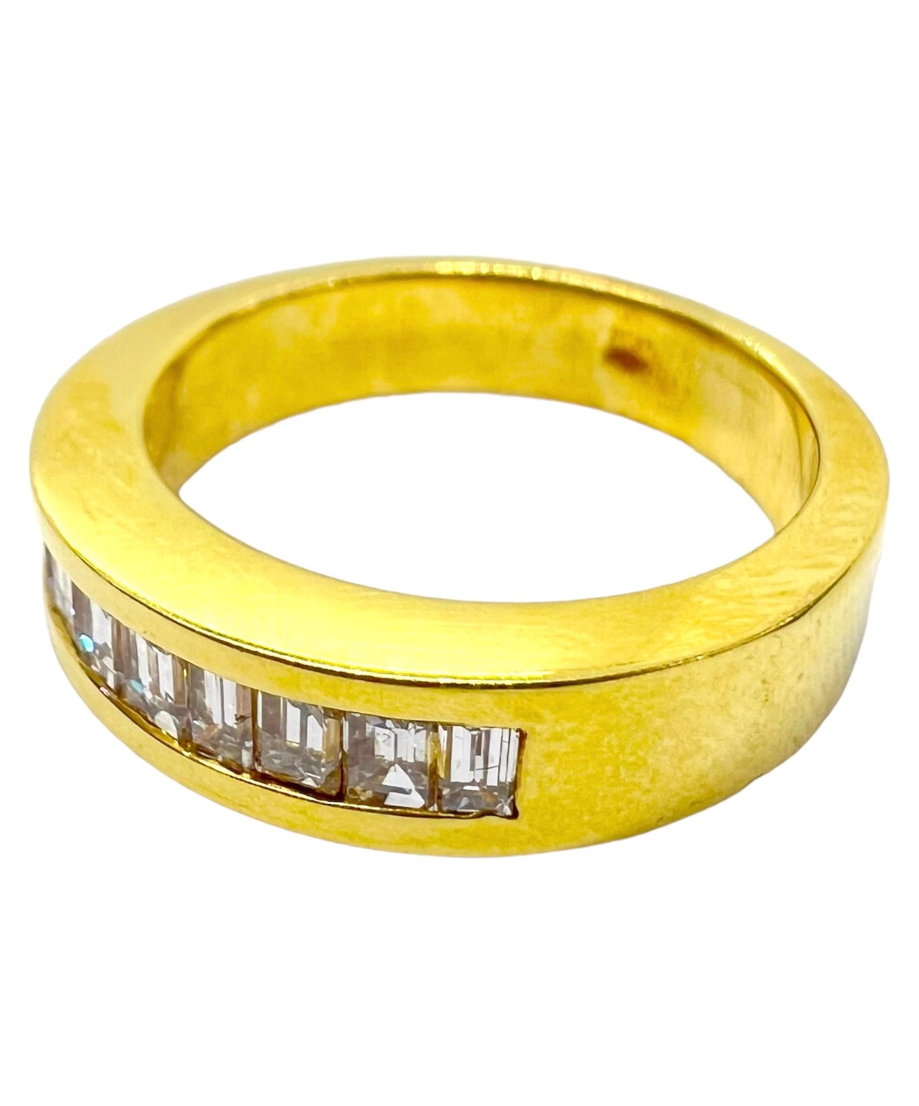 18K yellow gold band ring with emerald cut diamonds.

Sophia D by Joseph Dardashti LTD has been known worldwide for 35 years and are inspired by classic Art Deco design that merges with modern manufacturing techniques.