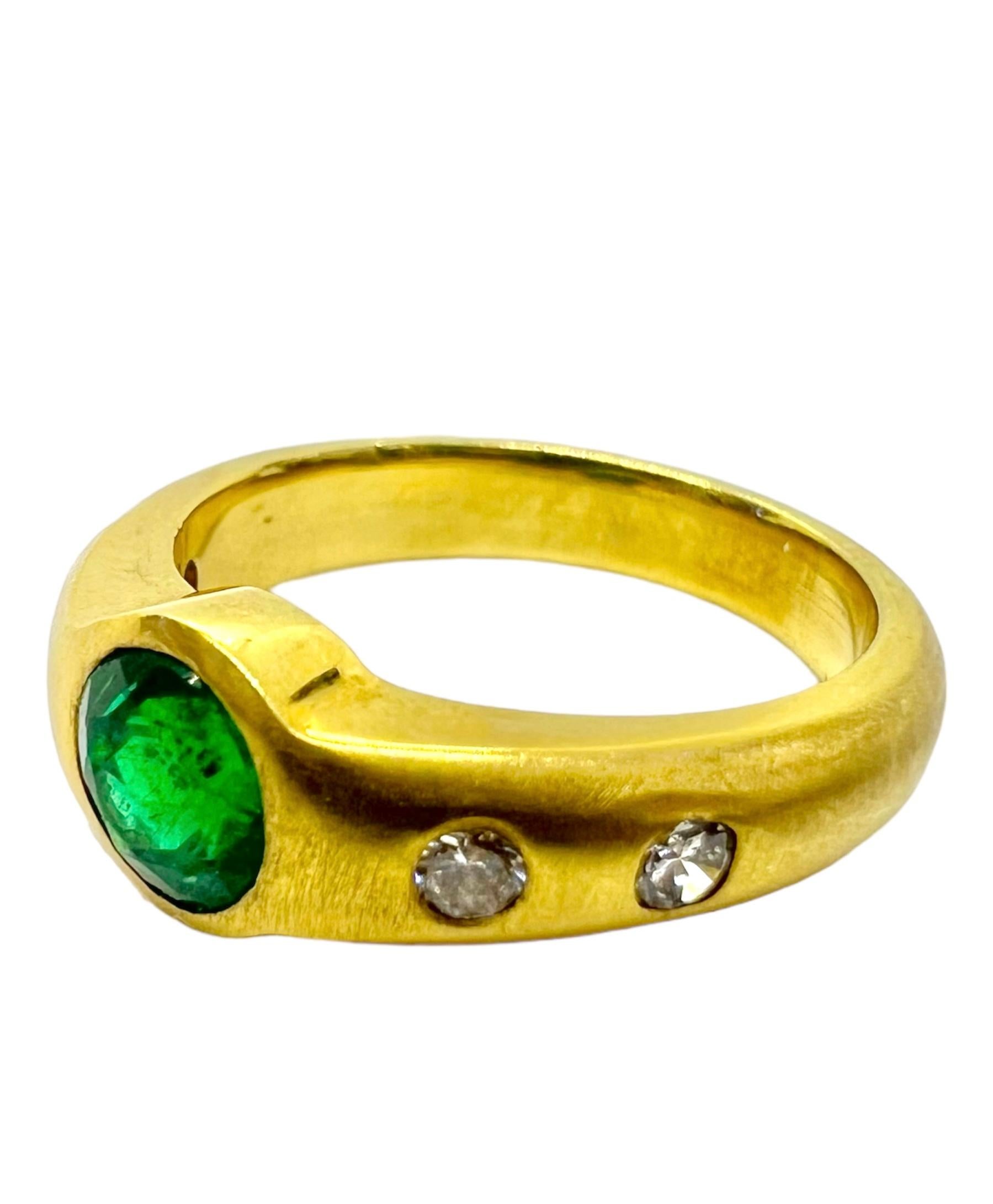 18K yellow gold ring with round cut emerald and diamonds.

 Sophia D by Joseph Dardashti LTD has been known worldwide for 35 years and are inspired by classic Art Deco design that merges with modern manufacturing techniques.        