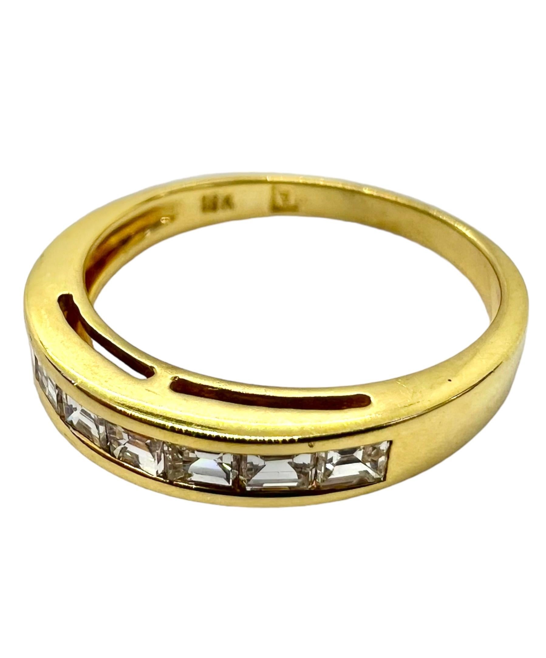 18K yellow gold ring with emerald cut diamonds.

Sophia D by Joseph Dardashti LTD has been known worldwide for 35 years and are inspired by classic Art Deco design that merges with modern manufacturing techniques.  