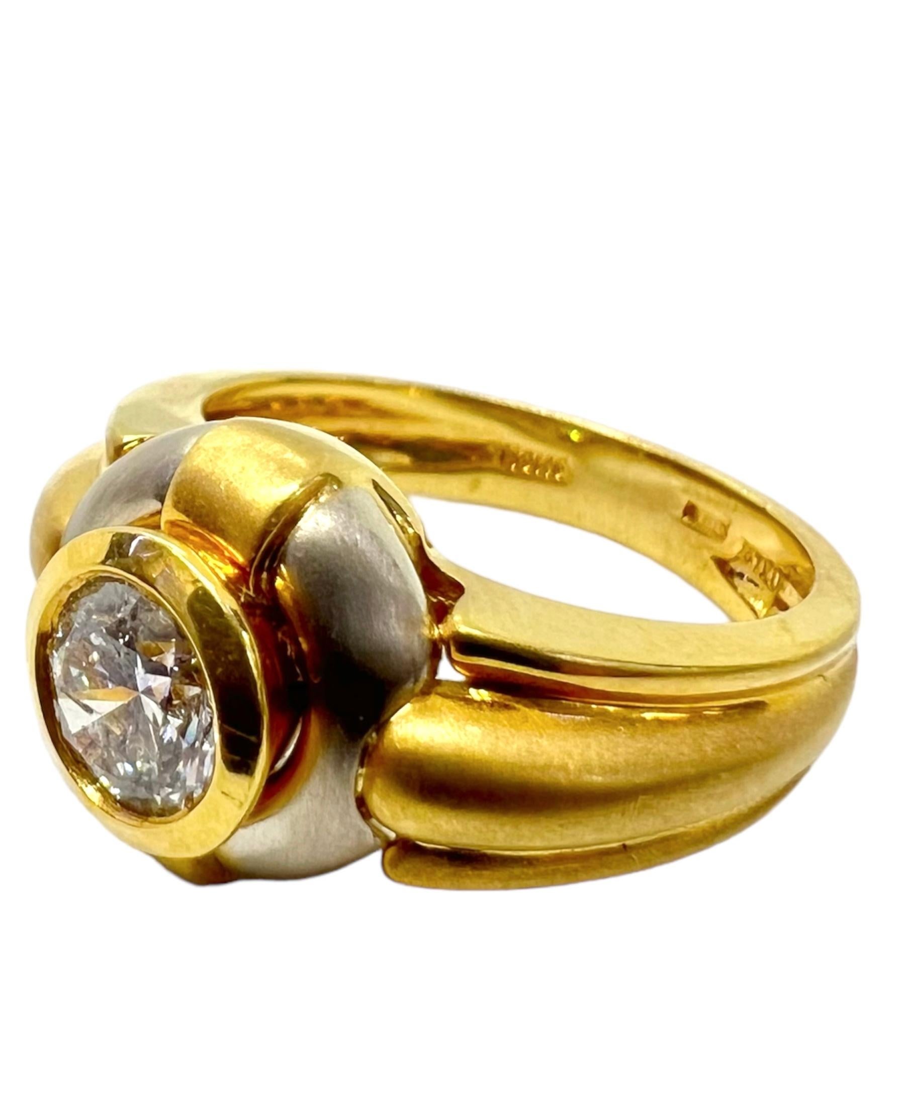 18K yellow gold ring with round center diamond.

Sophia D by Joseph Dardashti LTD has been known worldwide for 35 years and are inspired by classic Art Deco design that merges with modern manufacturing techniques.  