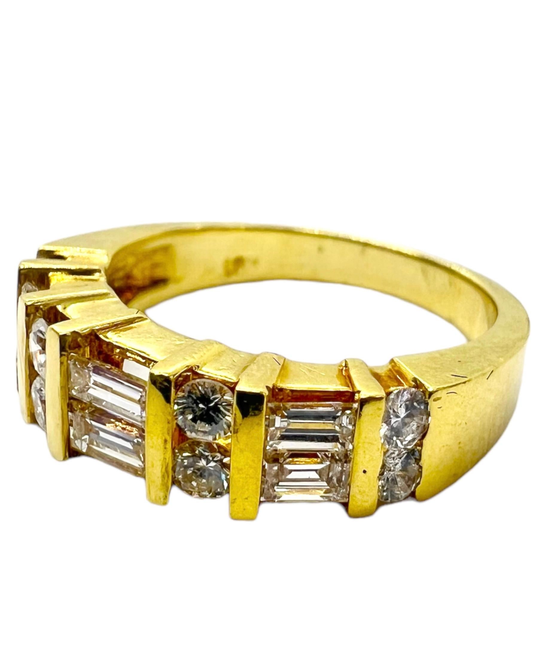 18K yellow gold ring with baguette cut diamonds and small round diamonds.

Sophia D by Joseph Dardashti LTD has been known worldwide for 35 years and are inspired by classic Art Deco design that merges with modern manufacturing techniques.   