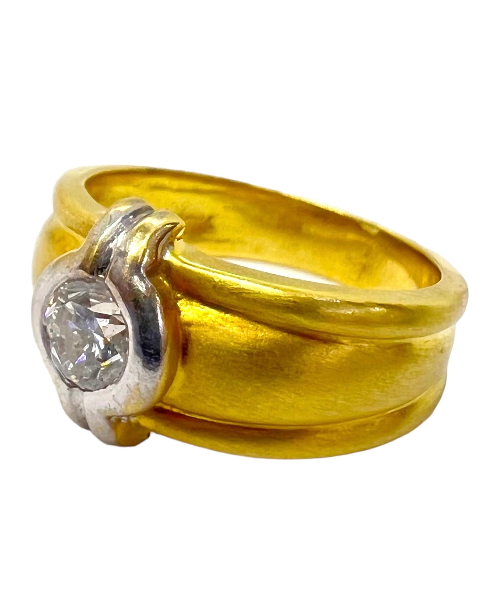 18K yellow gold ring with center diamond.

Sophia D by Joseph Dardashti LTD has been known worldwide for 35 years and are inspired by classic Art Deco design that merges with modern manufacturing techniques.  