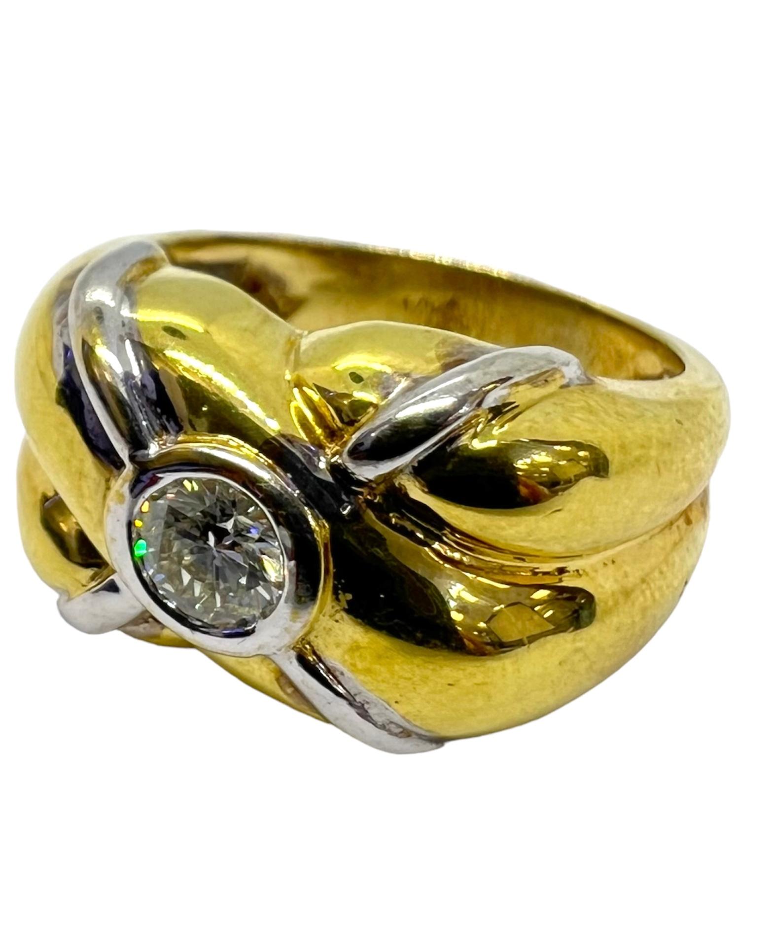18K yellow gold ring with round center diamond.

Sophia D by Joseph Dardashti LTD has been known worldwide for 35 years and are inspired by classic Art Deco design that merges with modern manufacturing techniques.  