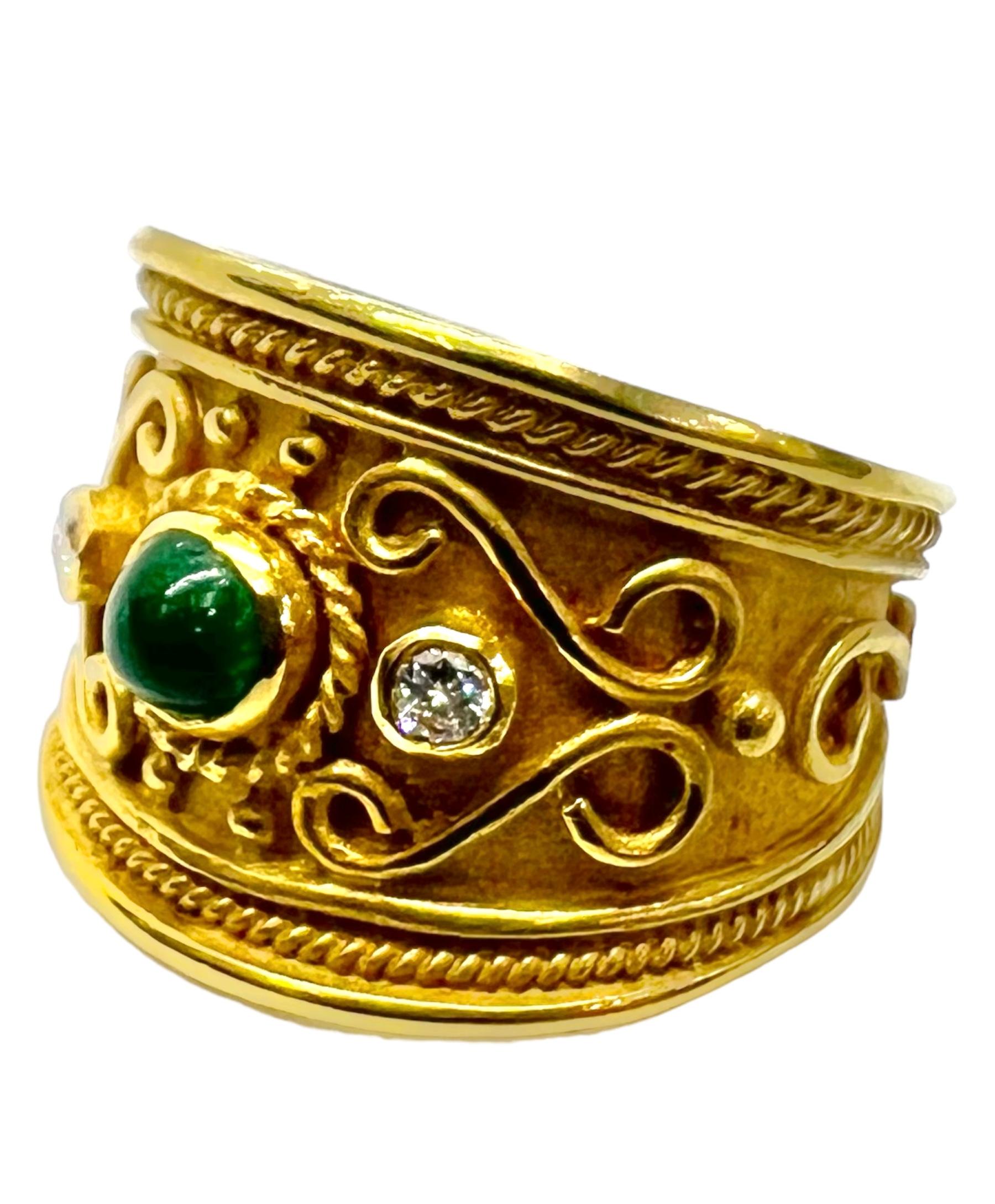 18K yellow gold ring with emerald and diamonds.

Sophia D by Joseph Dardashti LTD has been known worldwide for 35 years and are inspired by classic Art Deco design that merges with modern manufacturing techniques.  