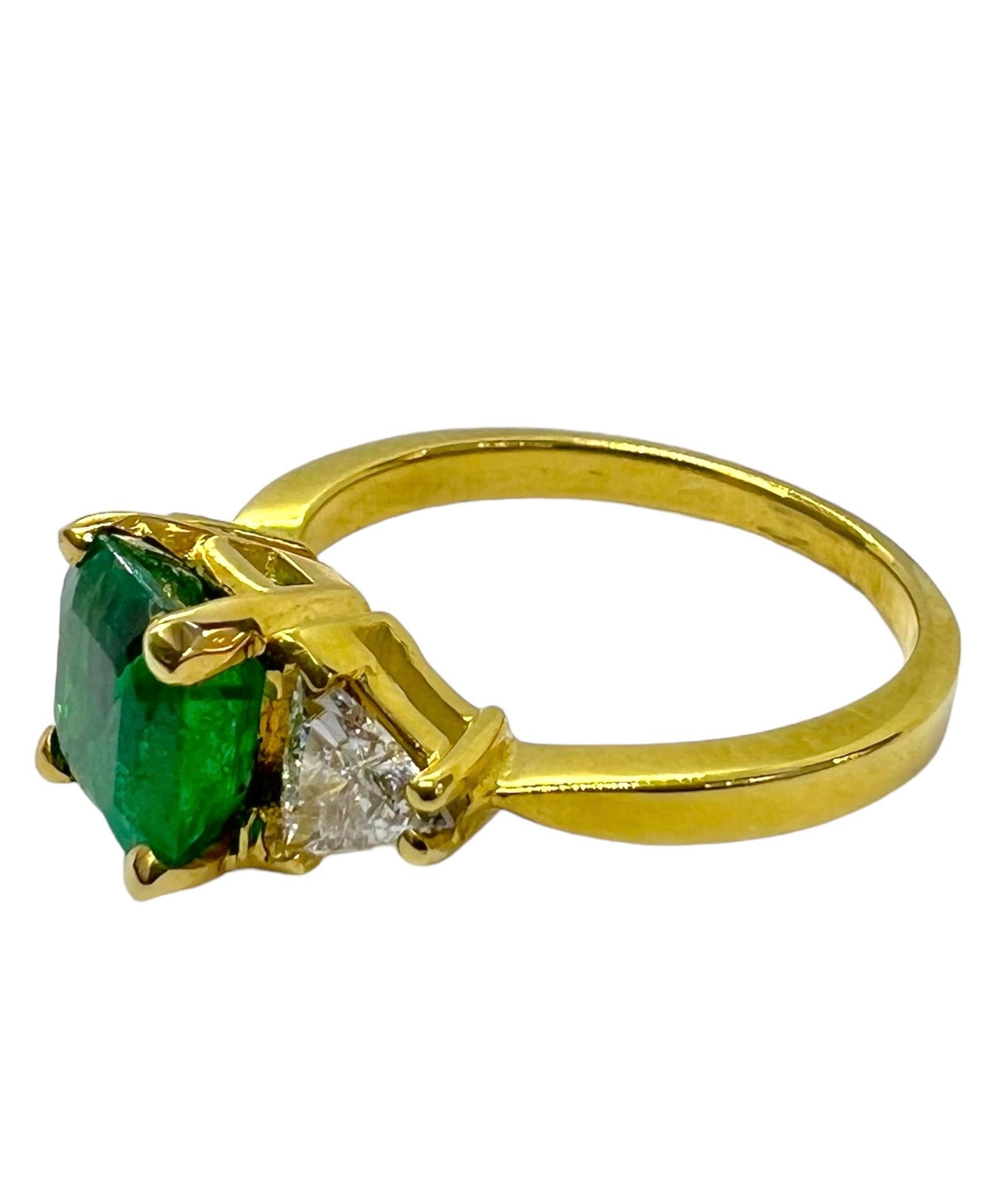 18K yellow gold ring with emerald center stone flanked by trillion cut diamonds.

Sophia D by Joseph Dardashti LTD has been known worldwide for 35 years and are inspired by classic Art Deco design that merges with modern manufacturing techniques.