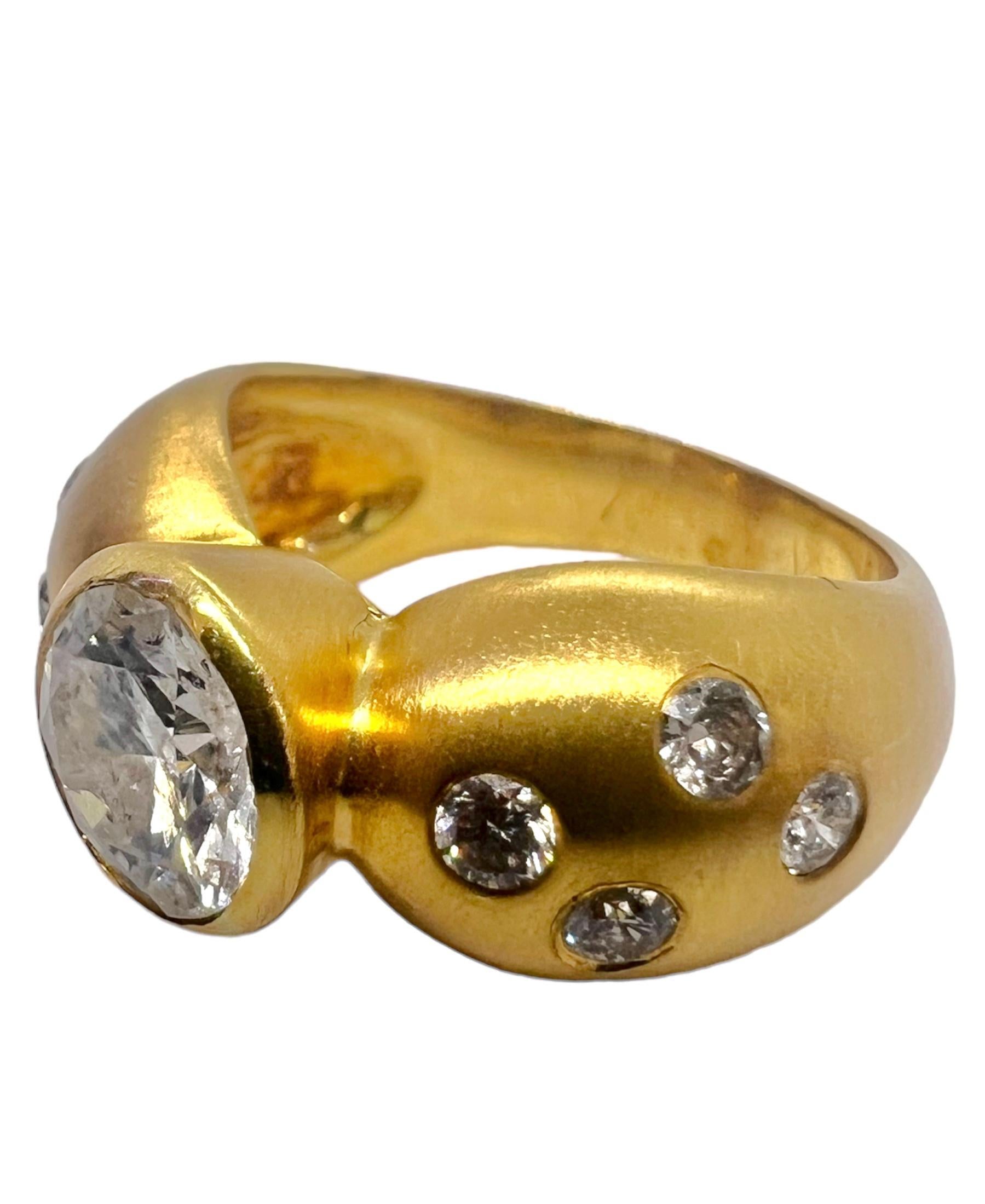 18K yellow gold ring with round center cut diamond accentuated with small round diamonds.

Sophia D by Joseph Dardashti LTD has been known worldwide for 35 years and are inspired by classic Art Deco design that merges with modern manufacturing