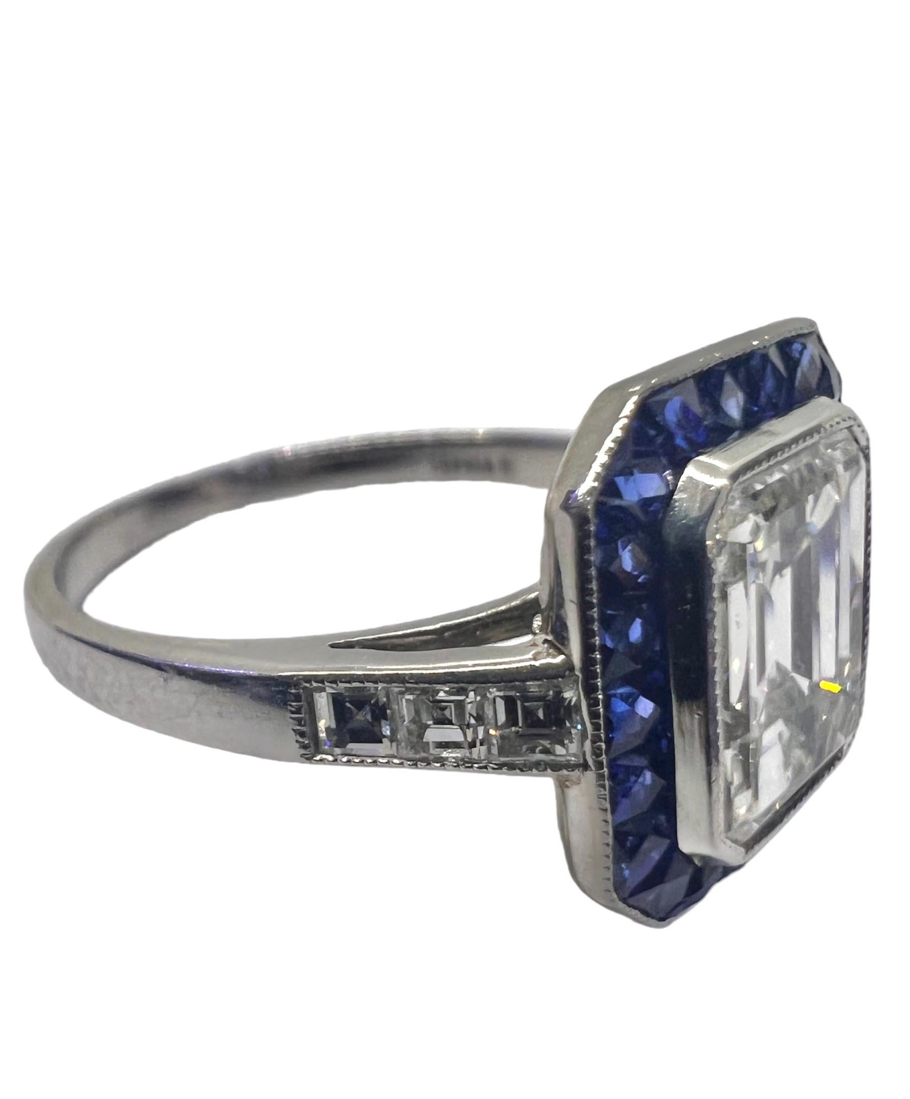 This Sophia D Art Deco style platinum ring contains a gorgeous 2.03 carat emerald cut diamond center which are surrounded by sapphires weighing 1.66 carats and diamonds weighing 0.21 carats.

Available for resizing.

Sophia D by Joseph Dardashti LTD