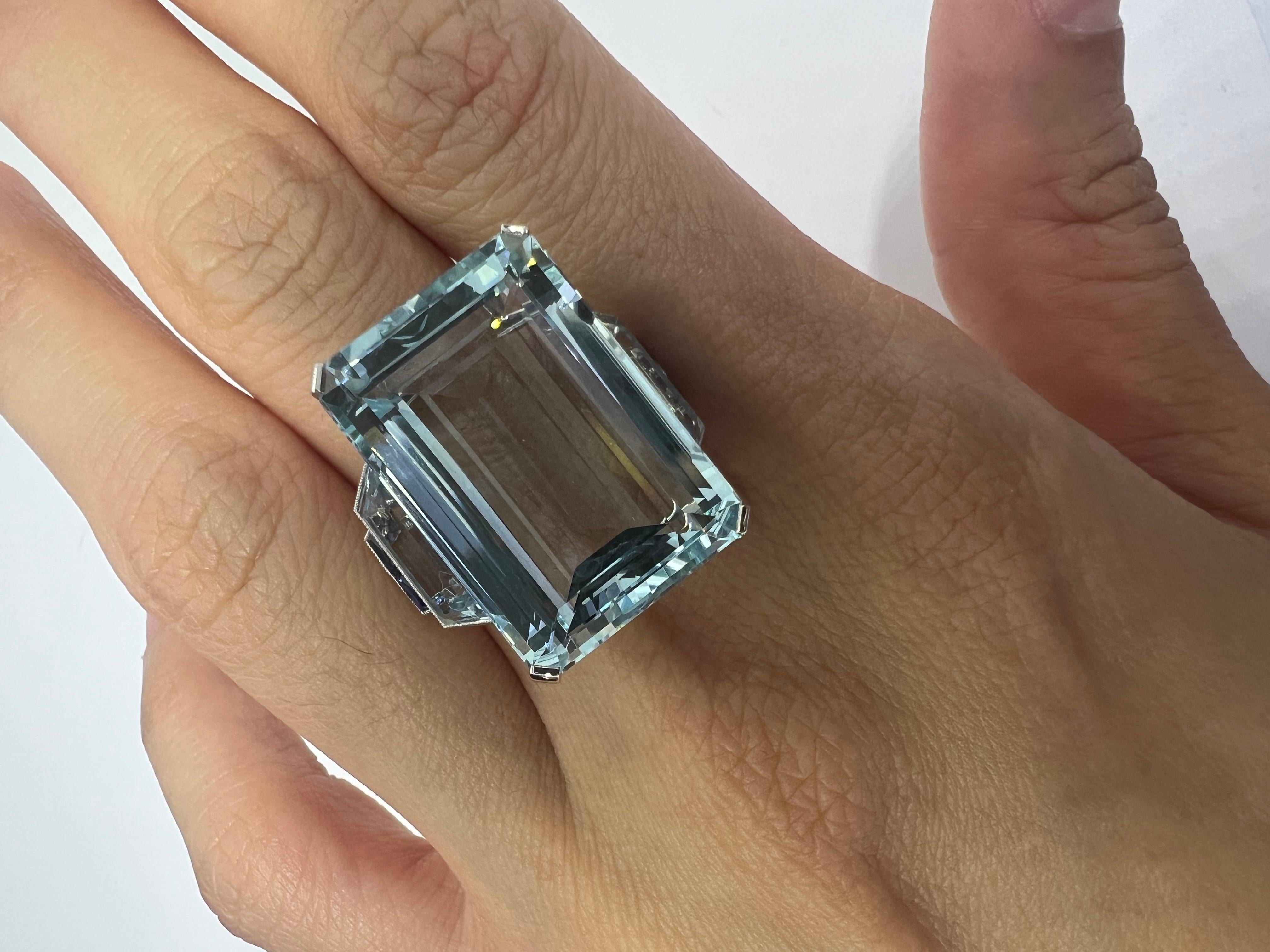 Platinum ring with 24.12 carat aquamarine, 0.27 carat diamond , 0.24 carat sapphire and 0.27 carat aquamarine.

Sophia D by Joseph Dardashti LTD has been known worldwide for 35 years and are inspired by classic Art Deco design that merges with