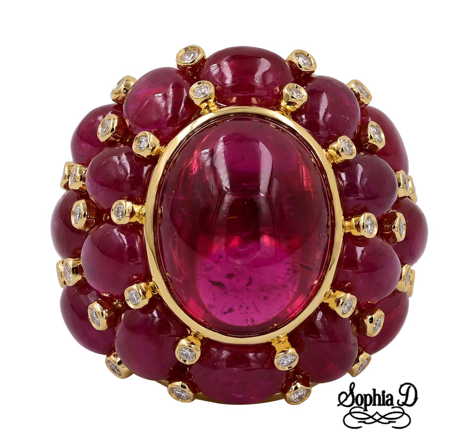 Sophia D. cocktail ring set in 18K yellow gold that features a 25.06 carat ruby, 13.62 carat tourmaline and 0.41 carat diamond. 

Sophia D by Joseph Dardashti LTD has been known worldwide for 35 years and are inspired by classic Art Deco design that
