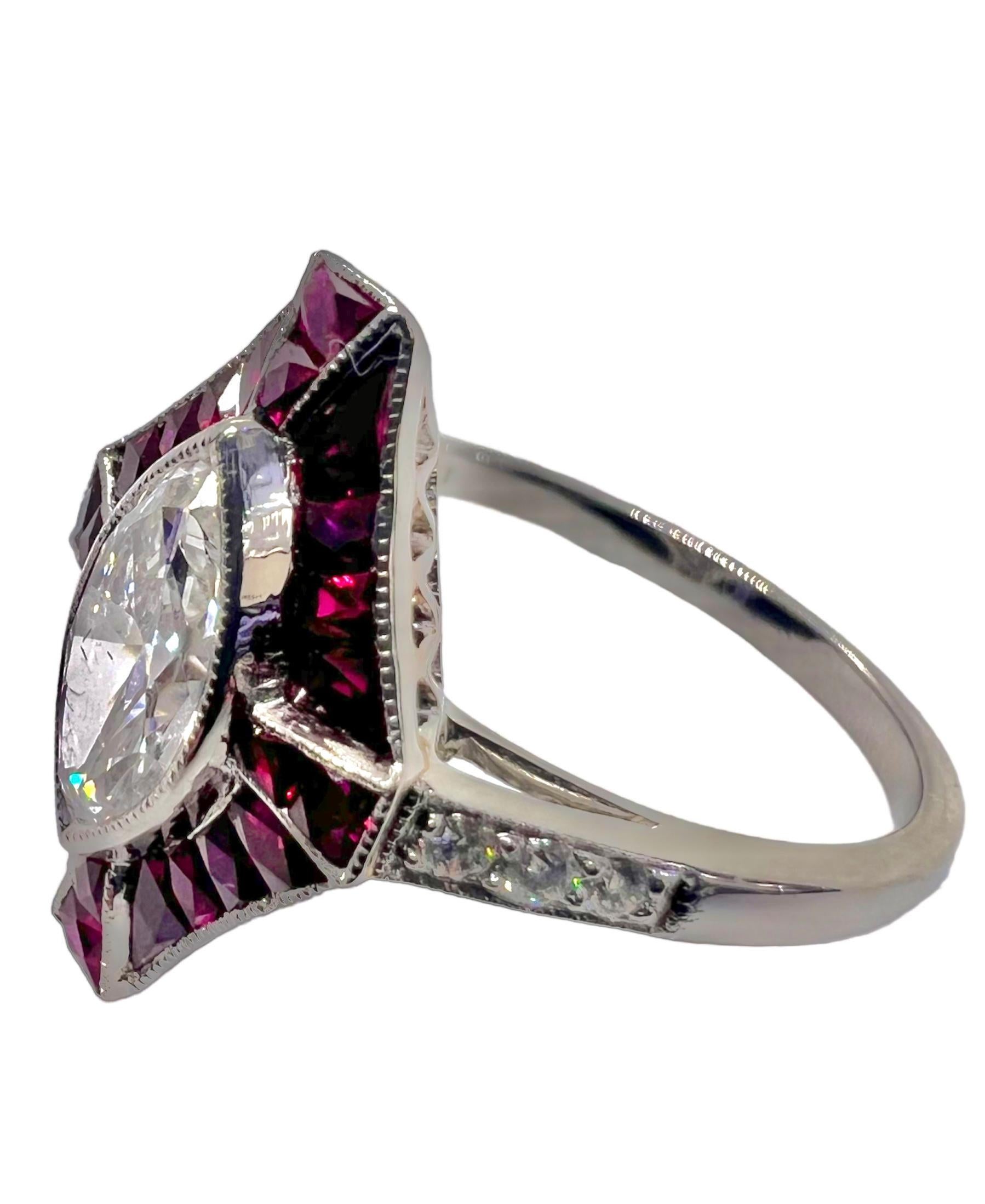 Sophia D. art deco style platinum ring with  marquise cut diamond center, 0.08 carat of small round diamond and 2.70 carats of rubies.

Sophia D by Joseph Dardashti LTD has been known worldwide for 35 years and are inspired by classic Art Deco