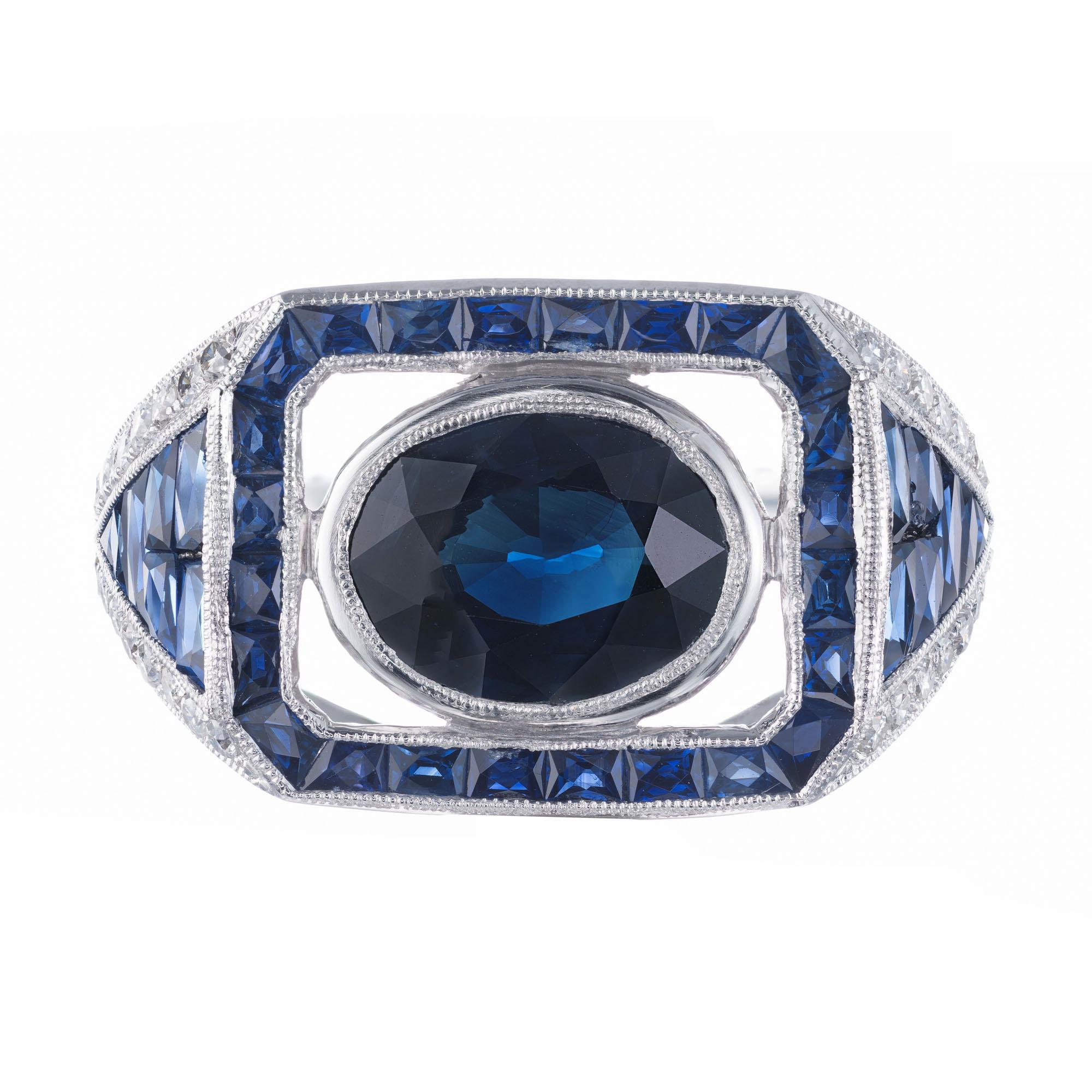 Sophia D sapphire and diamond ring. 2.80 carat natural GIA certified no heat oval center sapphire with a halo of round sapphires and French cut baguette sapphires and round brilliant cut diamonds, in a platinum setting. 

1 oval cut dark blue