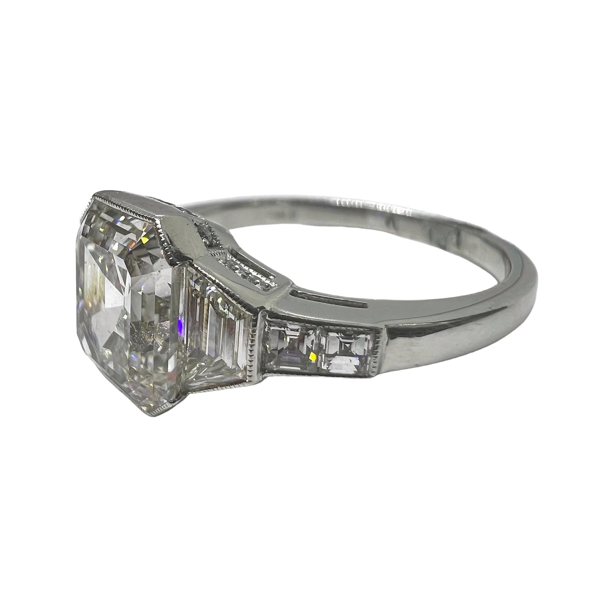 This engagement platinum ring has a center stone that weighs a total of 3.01 carat. Surrounded and accentuated with baguette cut and square diamonds that is approximately 0.73 carats.

Sophia D by Joseph Dardashti LTD has been known worldwide for 35