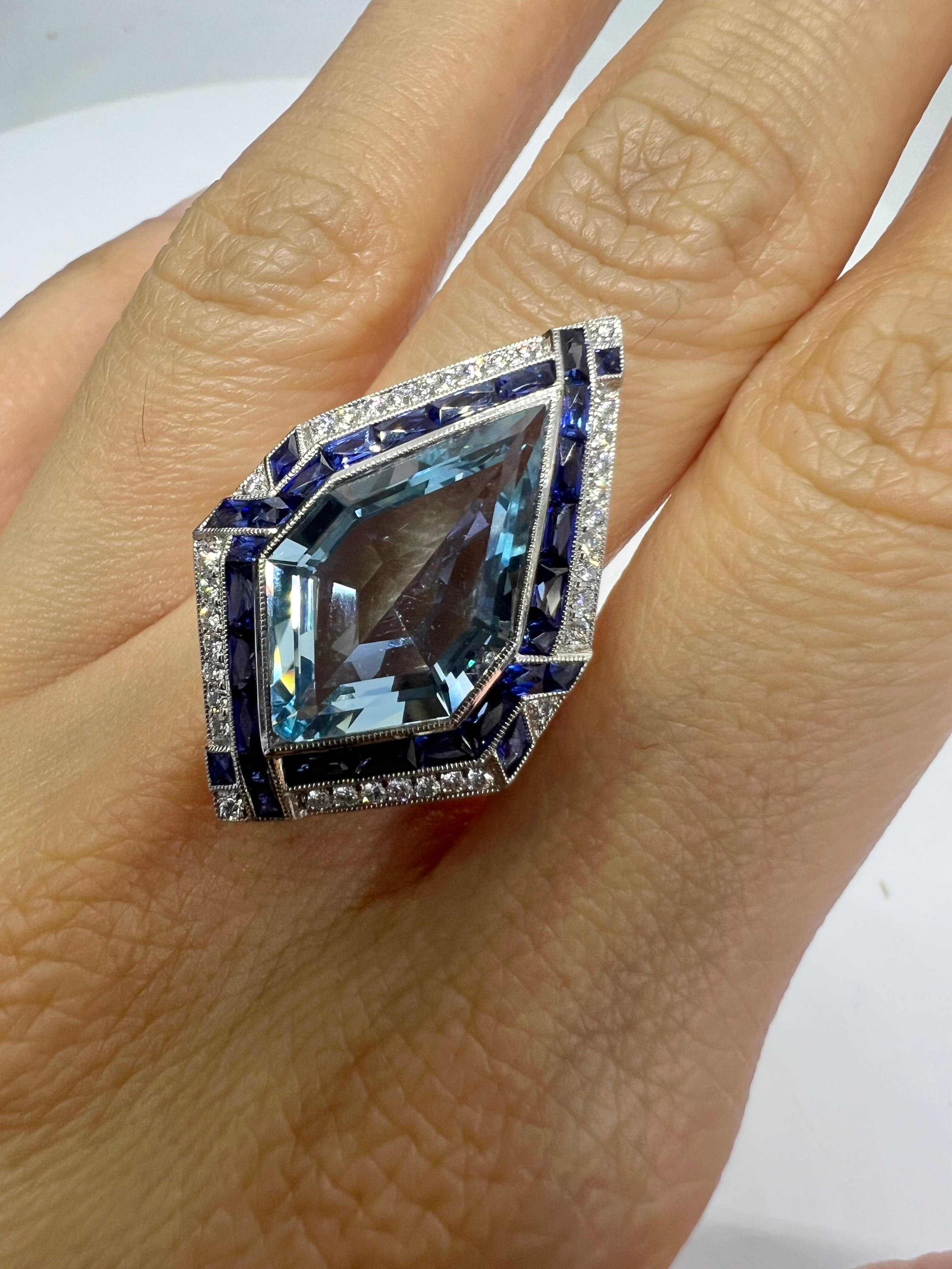 A platinum ring with 4.83 carat aquamarine, 1.10 carat sapphire and 0.41 carat diamond.

Sophia D by Joseph Dardashti LTD has been known worldwide for 35 years and are inspired by classic Art Deco design that merges with modern manufacturing