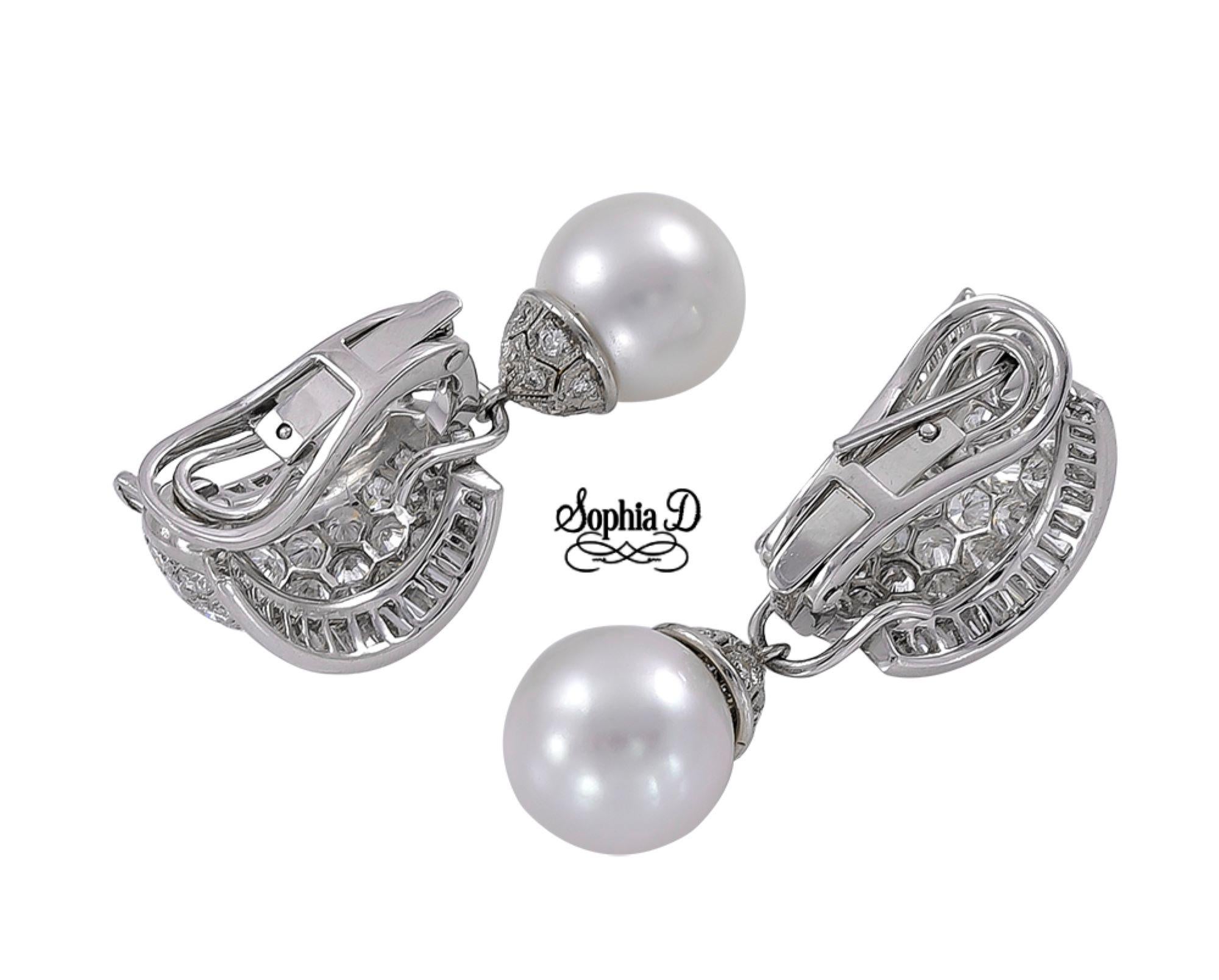 Sophia D. earrings featuring 5.95 carats of brilliant diamonds paired with radiant grey pearls, all beautifully set in platinum. This striking combination of luxury and elegance makes these earrings a stunning choice for any occasion.

Sophia D has