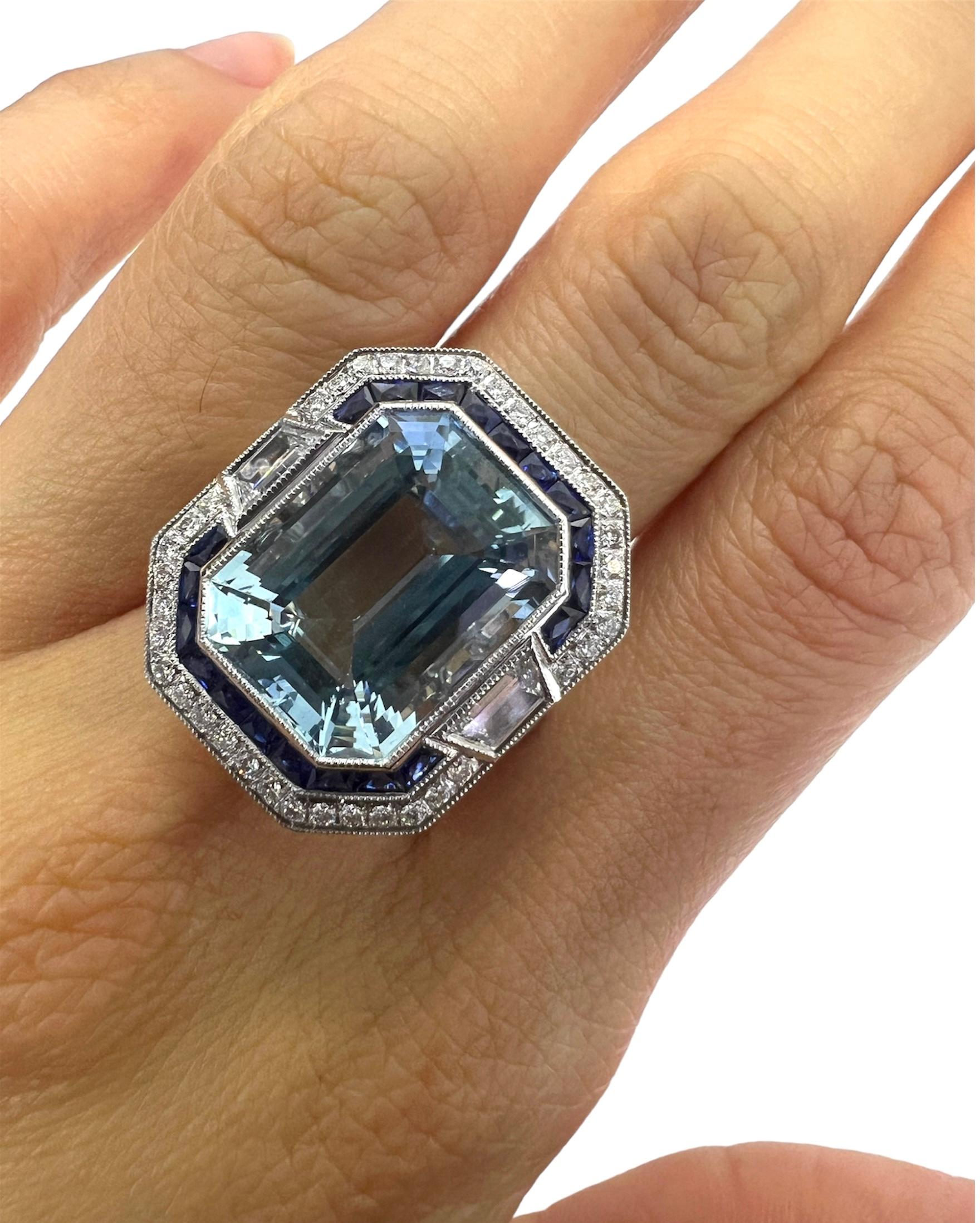 Platinum ring with 8.52 carat aquamarine, 0.60 carat sapphire and 1.04 carat diamond. 

Sophia D by Joseph Dardashti LTD has been known worldwide for 35 years and are inspired by classic Art Deco design that merges with modern manufacturing