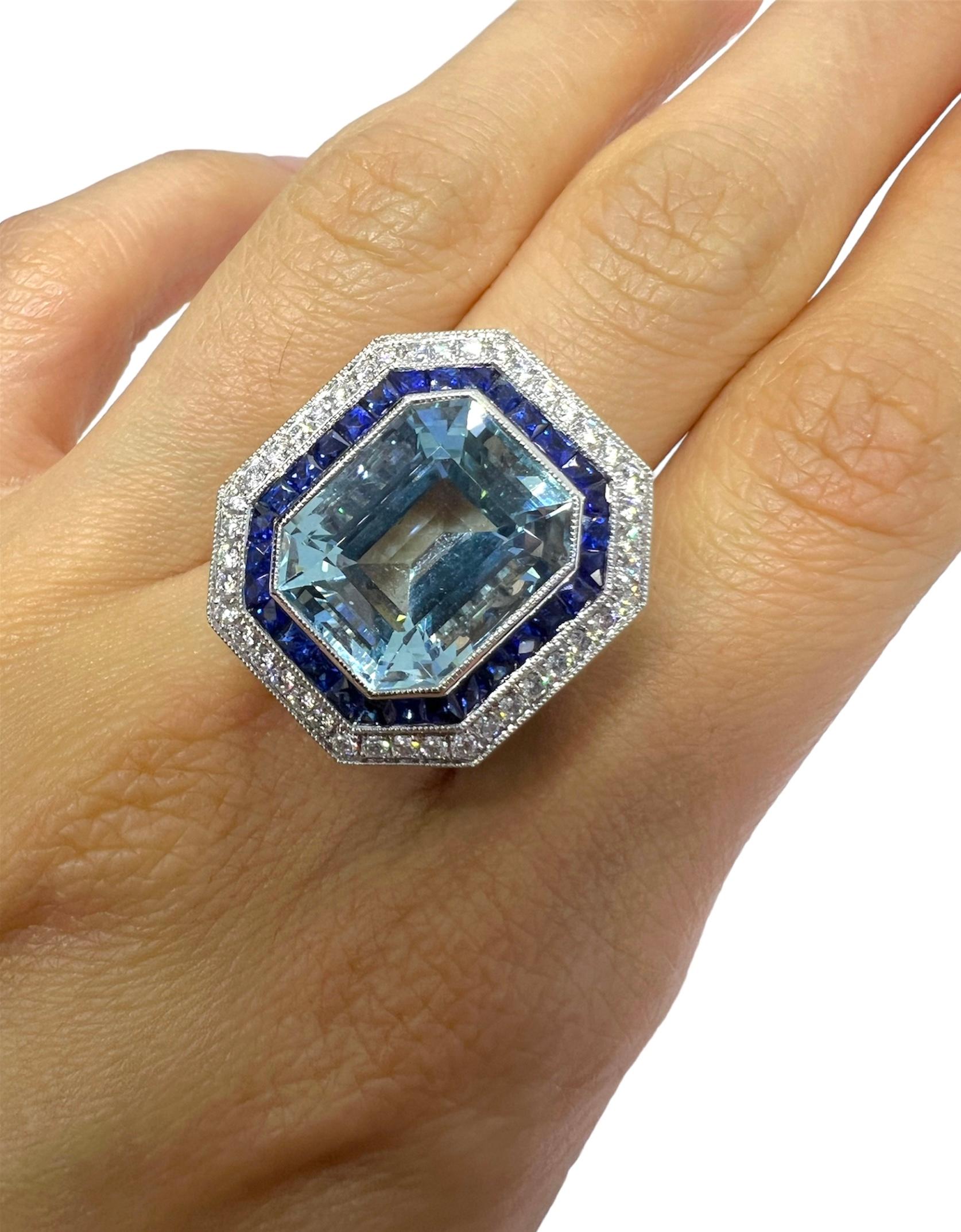 Platinum ring with 9.20 carat aquamarine, 1.20 carat diamond and 1.27 carat sapphire.

Sophia D by Joseph Dardashti LTD has been known worldwide for 35 years and are inspired by classic Art Deco design that merges with modern manufacturing