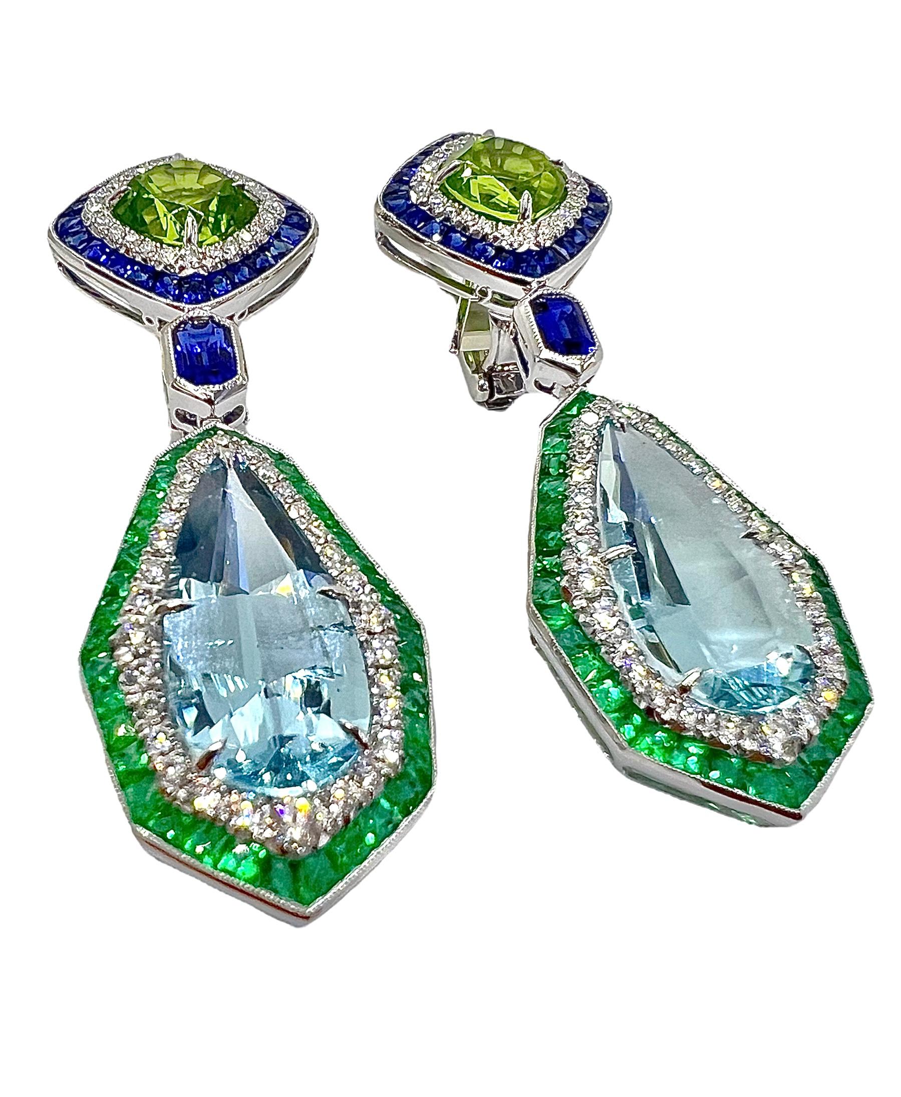 Platinum earrings with 8.60 carat aquamarine, 7.43 carat peridot, 3.68 carat diamond and 1.42 carat blue sapphire.

Sophia D by Joseph Dardashti LTD has been known worldwide for 35 years and are inspired by classic Art Deco design that merges with