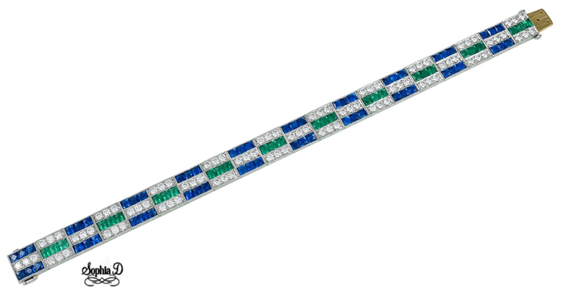 Art Deco inspired bracelet set in platinum that features a 4.16 carats of green emerald, 4.25 carats of diamond, 10.82 carats of blue sapphire.

Sophia D by Joseph Dardashti LTD has been known worldwide for 35 years and are inspired by classic Art