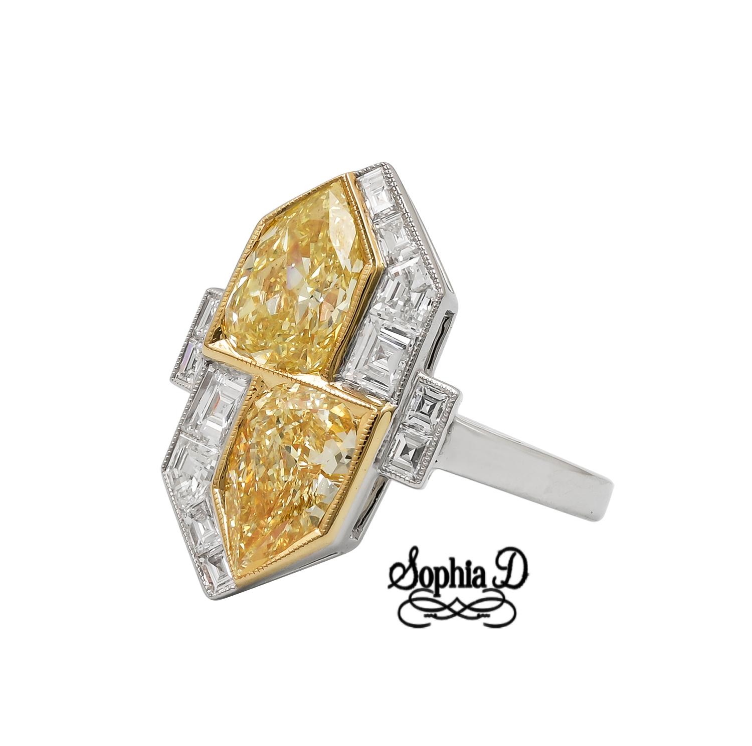 This art deco inspired ring set in platinum features a 1.33 carat and 1.54 carat pear shaped yellow diamonds and 0.87 carat surrounding diamonds.

Sophia D by Joseph Dardashti LTD has been known worldwide for 35 years and are inspired by classic Art
