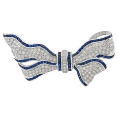 Sophia D. Blue Sapphire and Diamond Ribbon Brooch