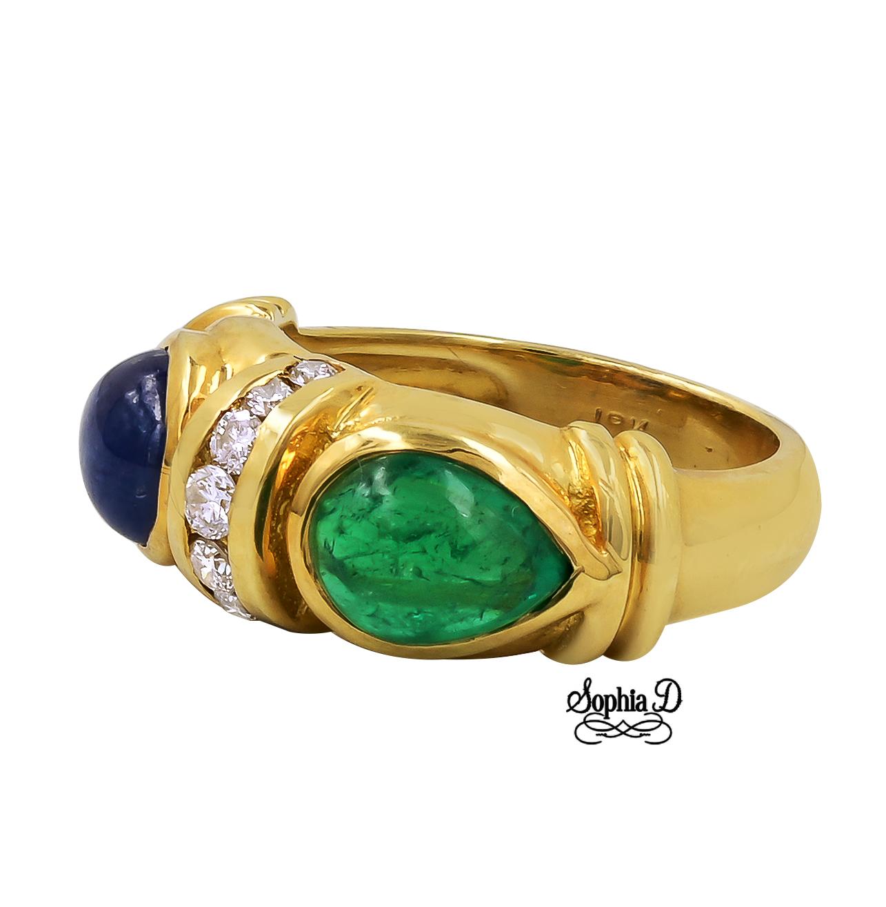18K yellow gold ring with blue sapphire, emerald and diamond.

Sophia D by Joseph Dardashti LTD has been known worldwide for 35 years and are inspired by classic Art Deco design that merges with modern manufacturing techniques.  