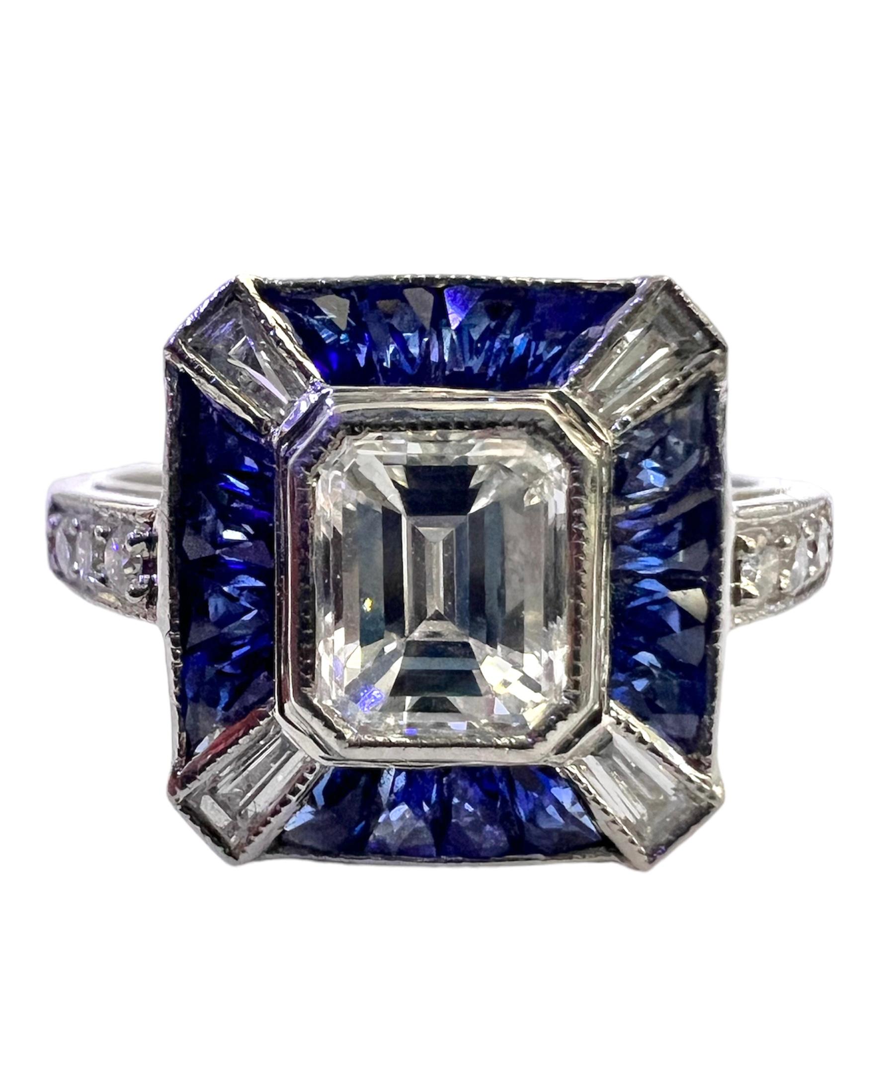 Designed by Sophia D. this platinum ring features a 0.73 carat emerald cut center stone accentuated with 1.57 carat blue sapphire and 0.19 carat diamond.

Sophia D by Joseph Dardashti LTD has been known worldwide for 35 years and are inspired by
