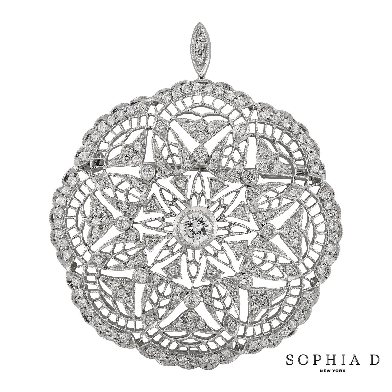 This refined piece features a central round diamond weighing 0.33 carats, set in platinum, and complemented by an additional 1.87 carats of surrounding diamonds. The design combines classic sophistication with understated elegance, making it a