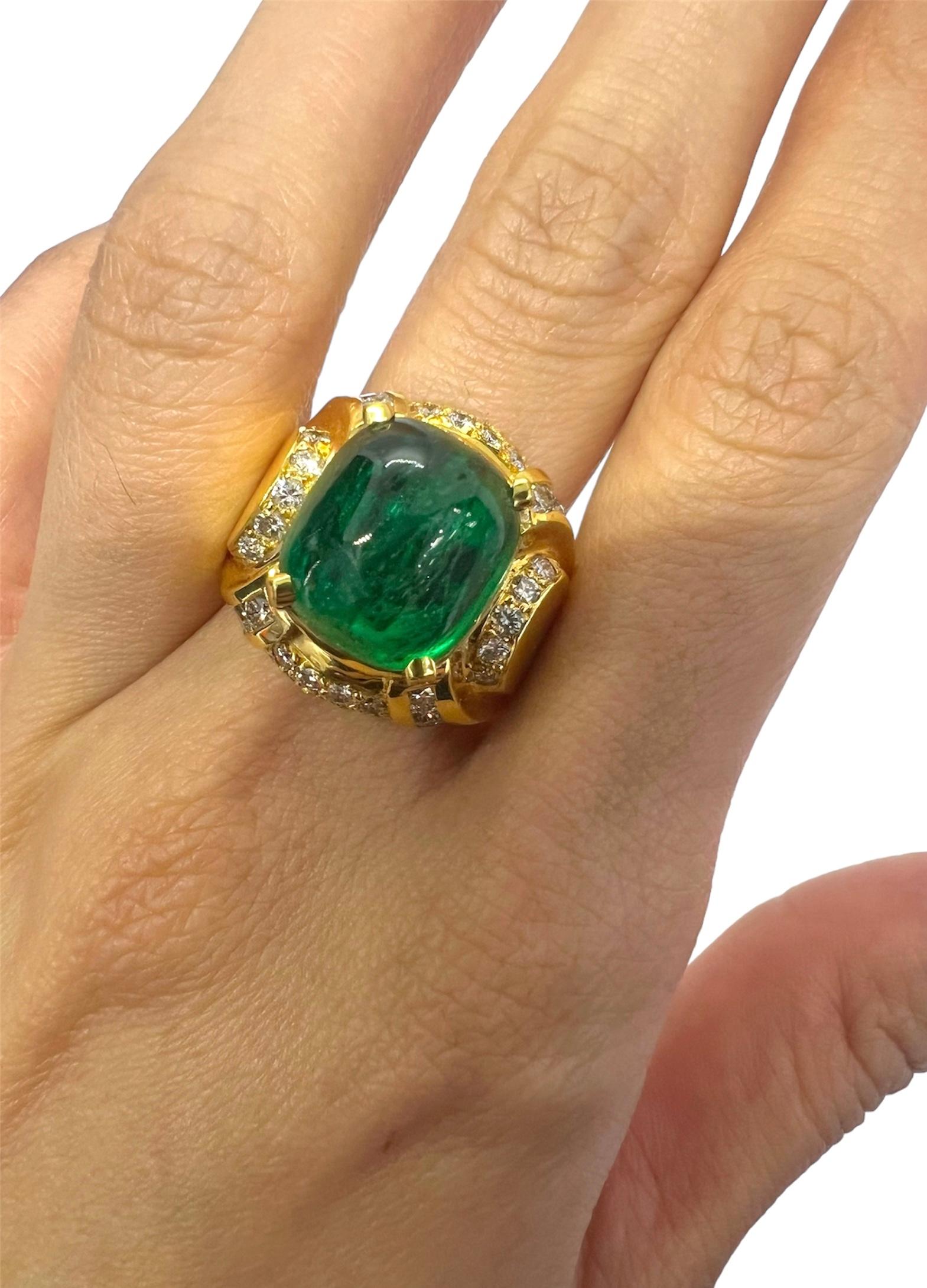 Yellow gold ring with cabochon emerald center stone accented with diamonds.

Sophia D by Joseph Dardashti LTD has been known worldwide for 35 years and are inspired by classic Art Deco design that merges with modern manufacturing techniques.