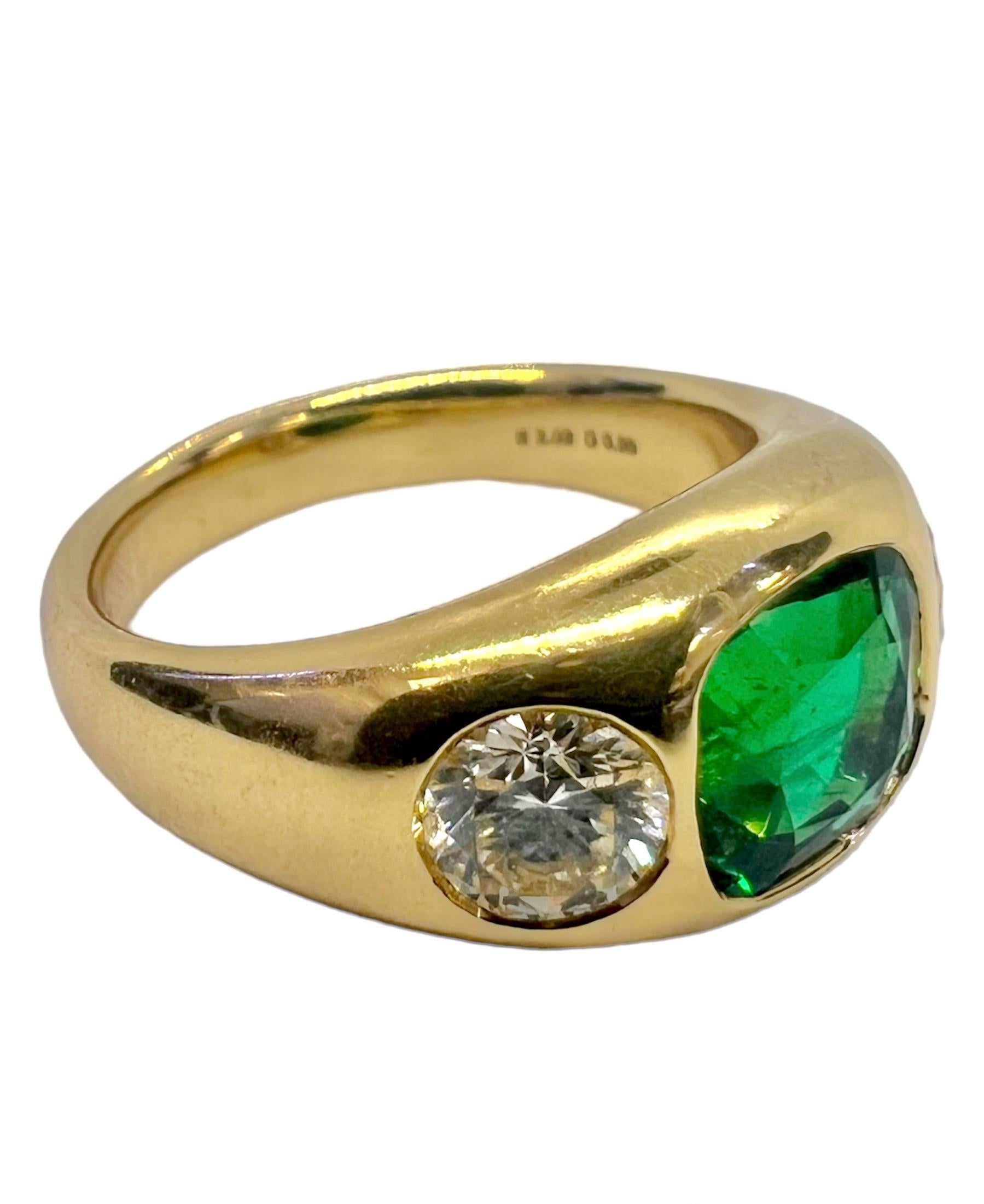 Gypsy ring set in 18K yellow gold that features a 2.02 carat cushion cut green emerald and .49 carat and .50 carat round diamonds.

Sophia D by Joseph Dardashti LTD has been known worldwide for 35 years and are inspired by classic Art Deco design