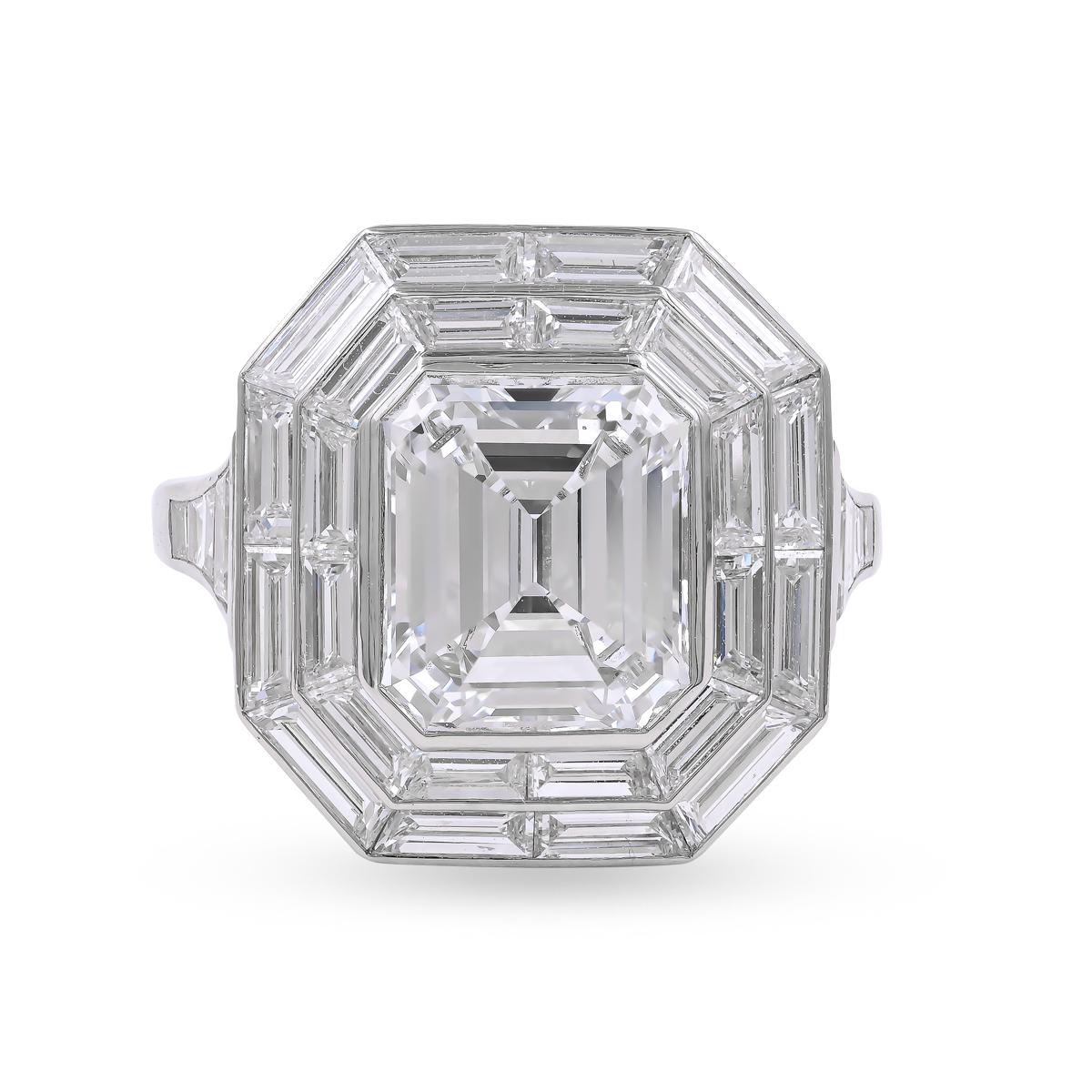 A Sophia D Mosaic ring featuring an emerald cut diamond surrounded with baguette cut diamonds, trapezoid cut diamonds and graduated tapered baguette cut diamonds set in platinum.

Total center diamond weight: 3.51 carats
Total surrounding diamond