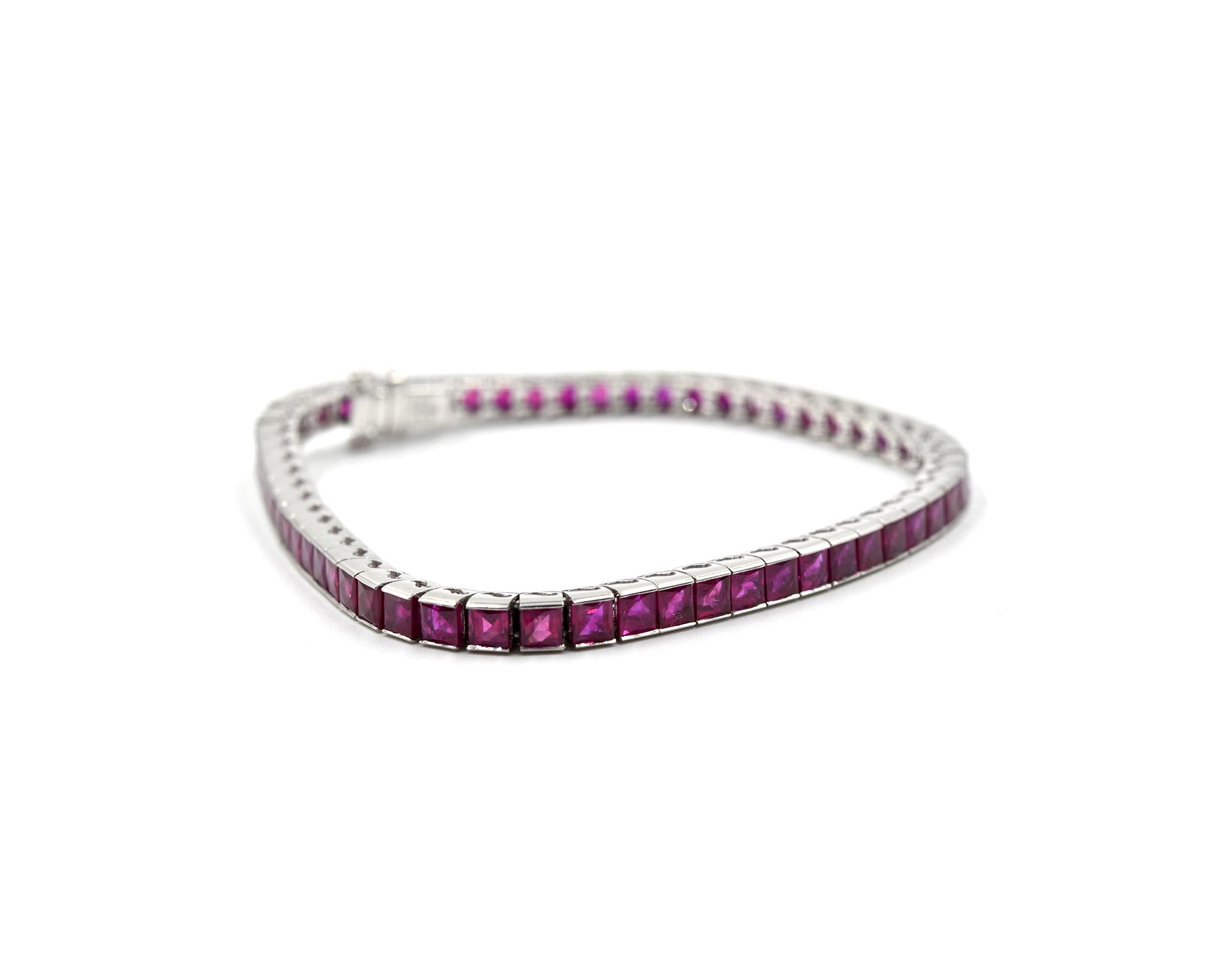 Designer: Sophia D
Material: platinum
Rubies: 57 square cut natural ruby gemstones = 5.13 carat total weight
Dimensions: the bracelet is 7-inch long and 1/8-inch wide
Weight: 21.85 grams
Retail: $6,800
