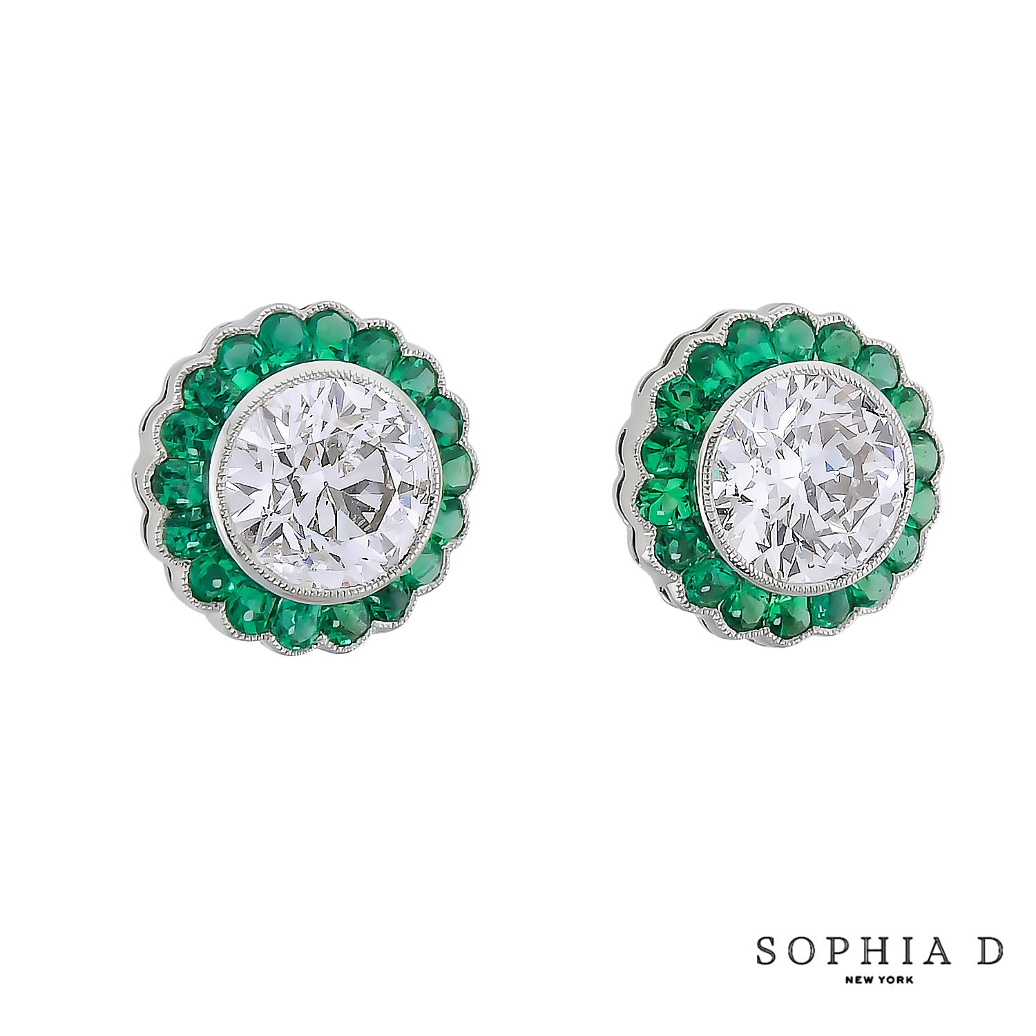 Platinum stud earrings showcasing total of 2.56 ct center diamonds, encircled by 0.70 ct of vibrant emeralds. A classic silhouette elevated by bold contrast and timeless sophistication.

Sophia D has been known world-wide for over 40 years because