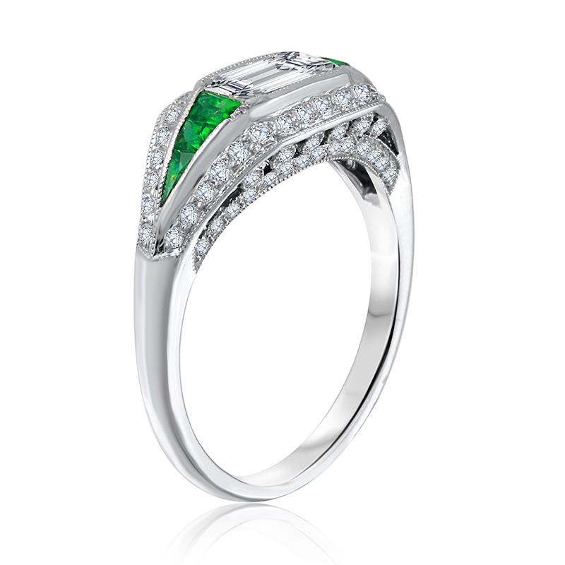 -1.05ct emerald cut 
-Custom green emerald cut diamonds on sides 
-Size 6.5