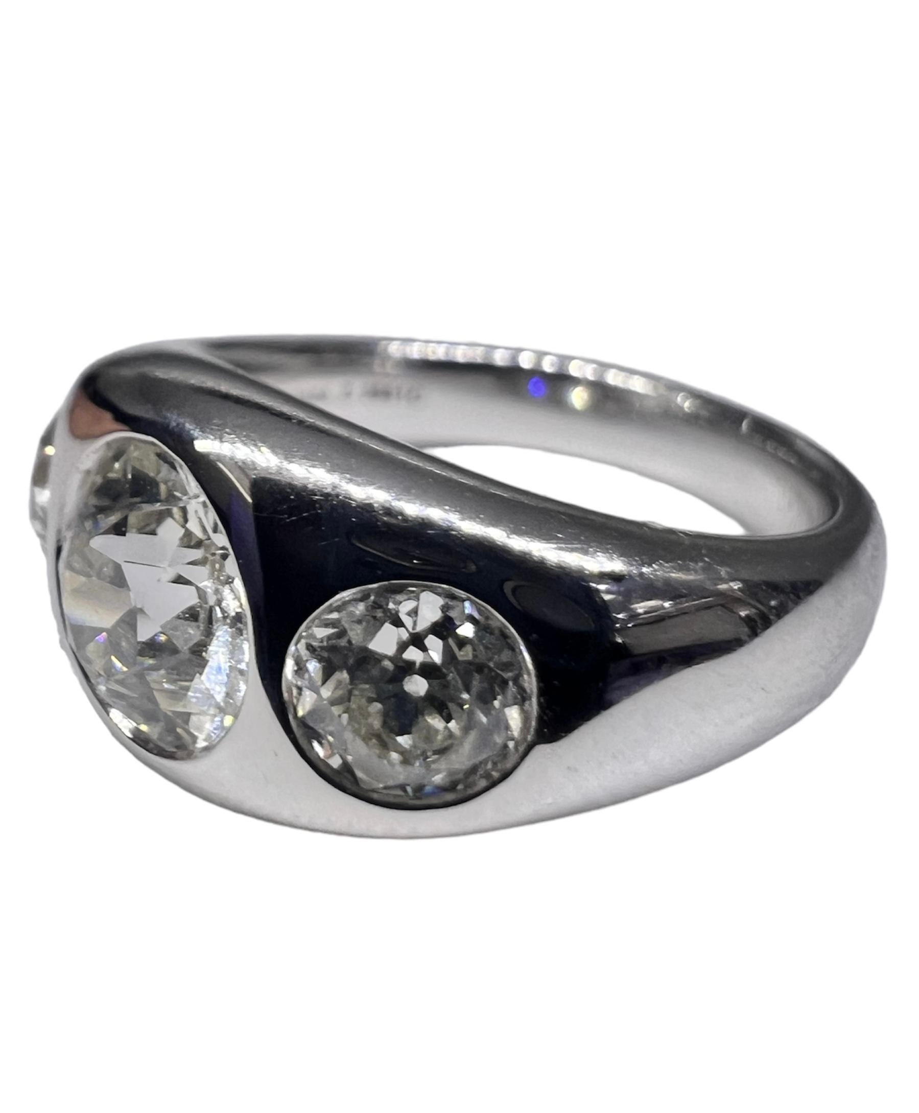 Three stone gypsy ring set in platinum by Sophia D that features a round diamond center stone that weighs 1.39 carats accentuated with two round diamonds on the side that weighs 0.50 carat and 0.46 carat.

Sophia D by Joseph Dardashti LTD has been