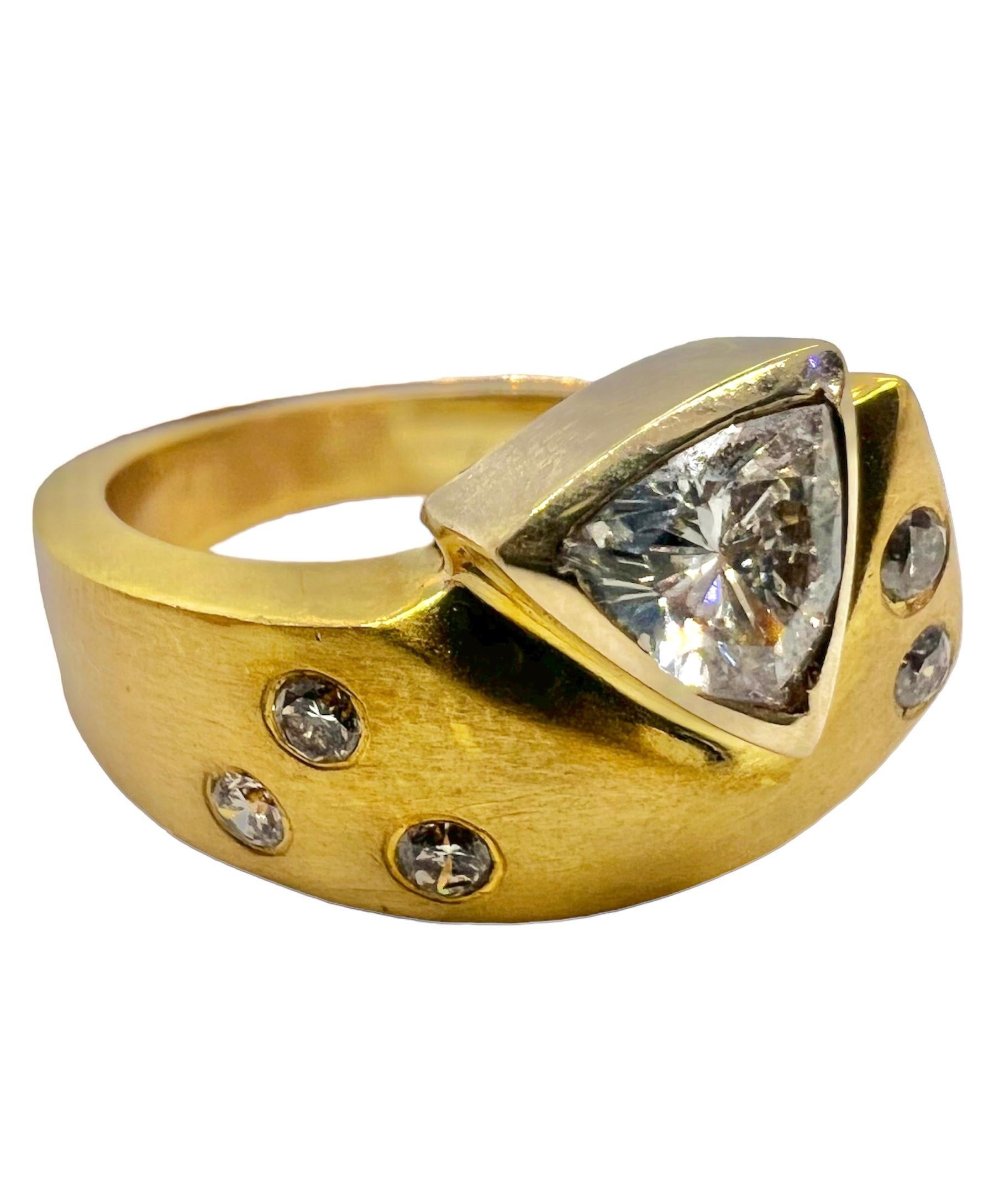 18K yellow gold ring with trillion cut center diamond and accentuated with small round diamonds.

Sophia D by Joseph Dardashti LTD has been known worldwide for 35 years and are inspired by classic Art Deco design that merges with modern