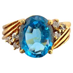 Sophia D. Anillo vintage de oro amarillo de 14 quilates con remolino de topacio de talla ovalada