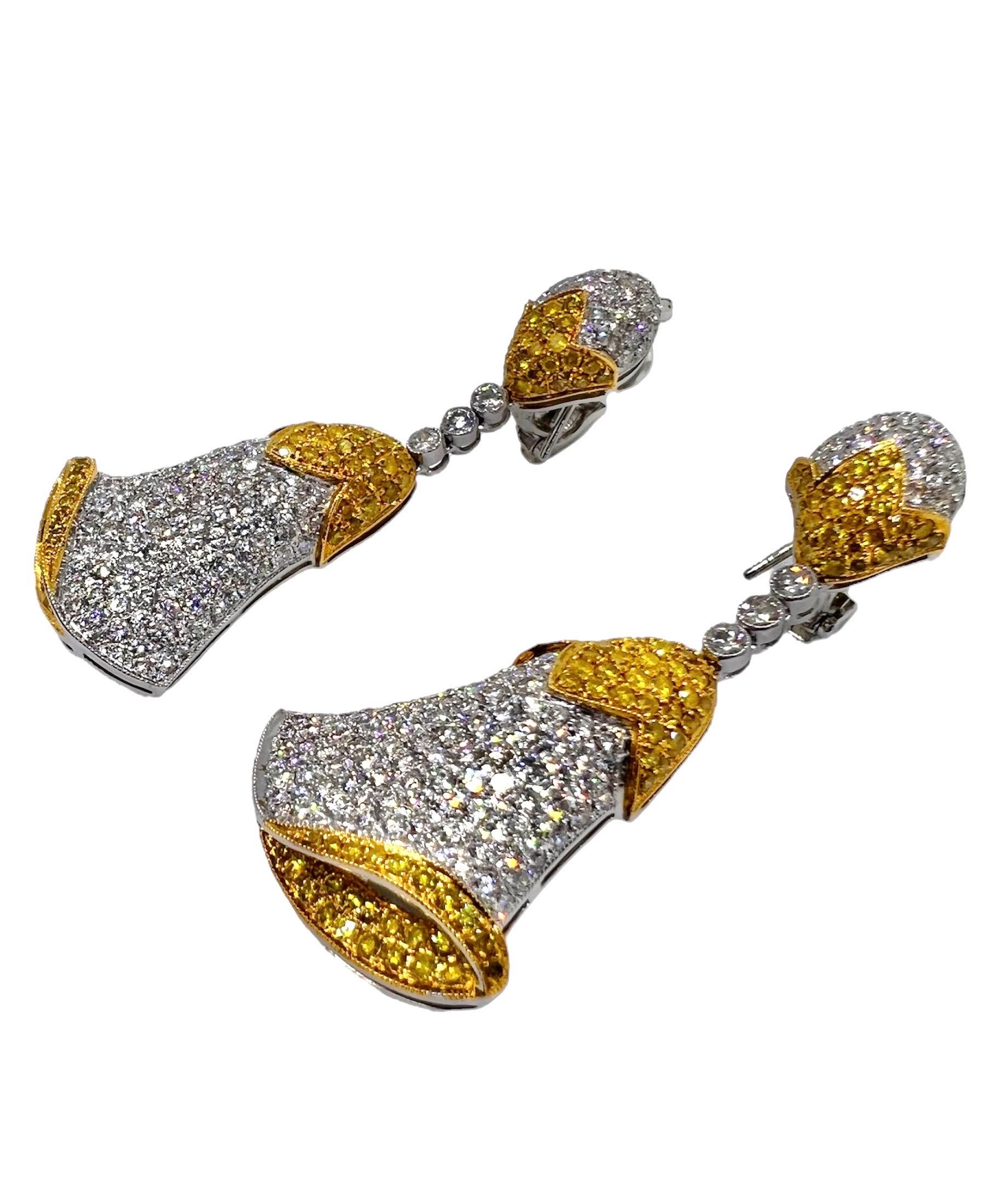 Unique bell inspired earrings designed by Sophia D, these earrings set in platinum features a yellow diamond that weighs 2.60 carats and white diamonds that weighs 5.44 carats.

Sophia D by Joseph Dardashti LTD has been known worldwide for 35 years