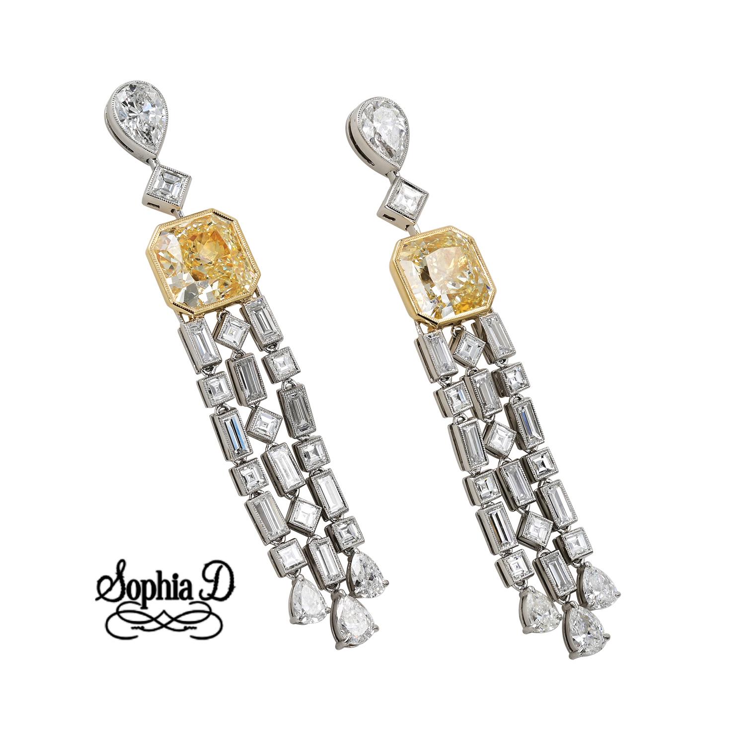 Sophia D hanging clip earrings in platinum setting. The earrings feature yellow diamonds that weigh 3.42 carats and 3.50 carats and white diamonds that totals 5.10 carats. 

Sophia D by Joseph Dardashti LTD has been known worldwide for 35 years and