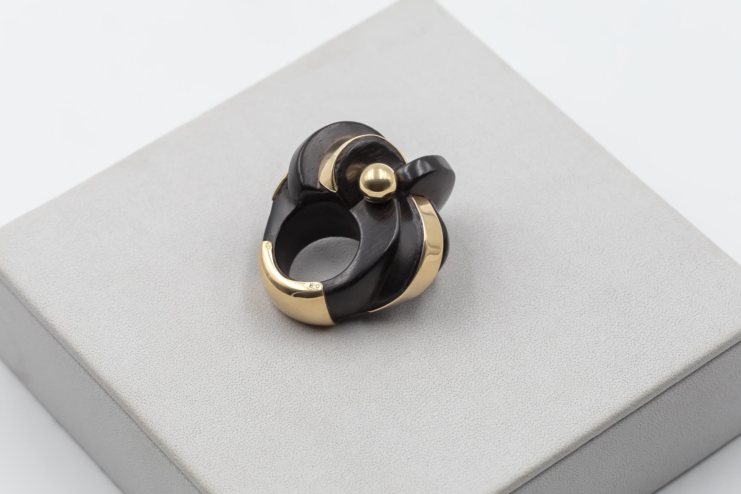 The Ebony and 18ct gold sculpture ring designed by Sophia Vari sounds like a unique and exclusive piece. Limited to a total of 6 pieces, with 2 artist proofs (AP), it adds to its rarity and desirability.

The specific ring offered on 1stDibs is