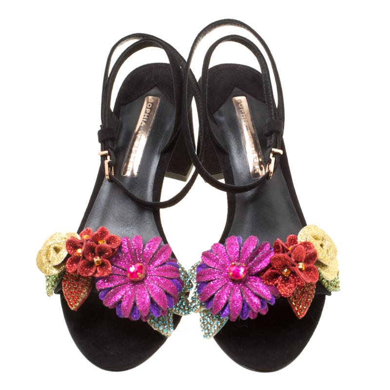 Sophia Webster has been a favourite worldwide for her unique, creative and modern designs. She continues to charm us with these stunning Lilico sandals. These black sandals are crafted from suede and feature an open toe silhouette. They flaunt