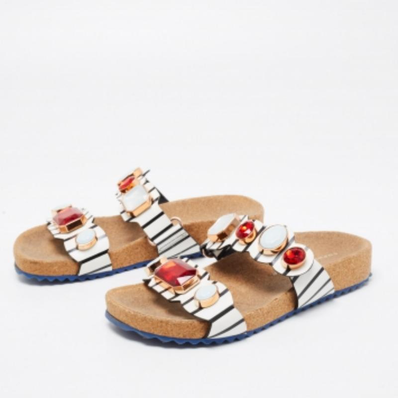 Sophia Webster is known for its beautiful and feminine shoes which are highly coveted. These black and white Nautical sandals are simply stunning with gem embellishments and velcro straps. This magical pair is perfect for relaxed beach parties.
