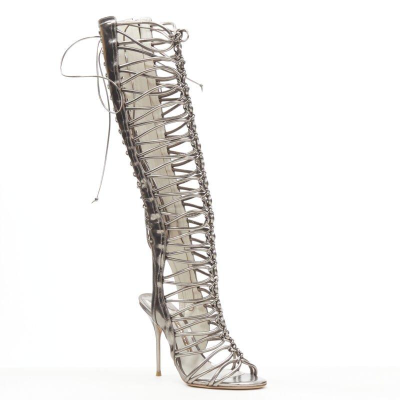 SOPHIA WEBSTER Fantasy silver strappy gladiator high heel sandals EU37.5
Reference: GIYG/A00116
Brand: Sophia Webster
Model: Silver gladiator sandals
Collection: Runway
Material: Leather
Color: Silver
Pattern: Solid
Closure: Zip
Lining: