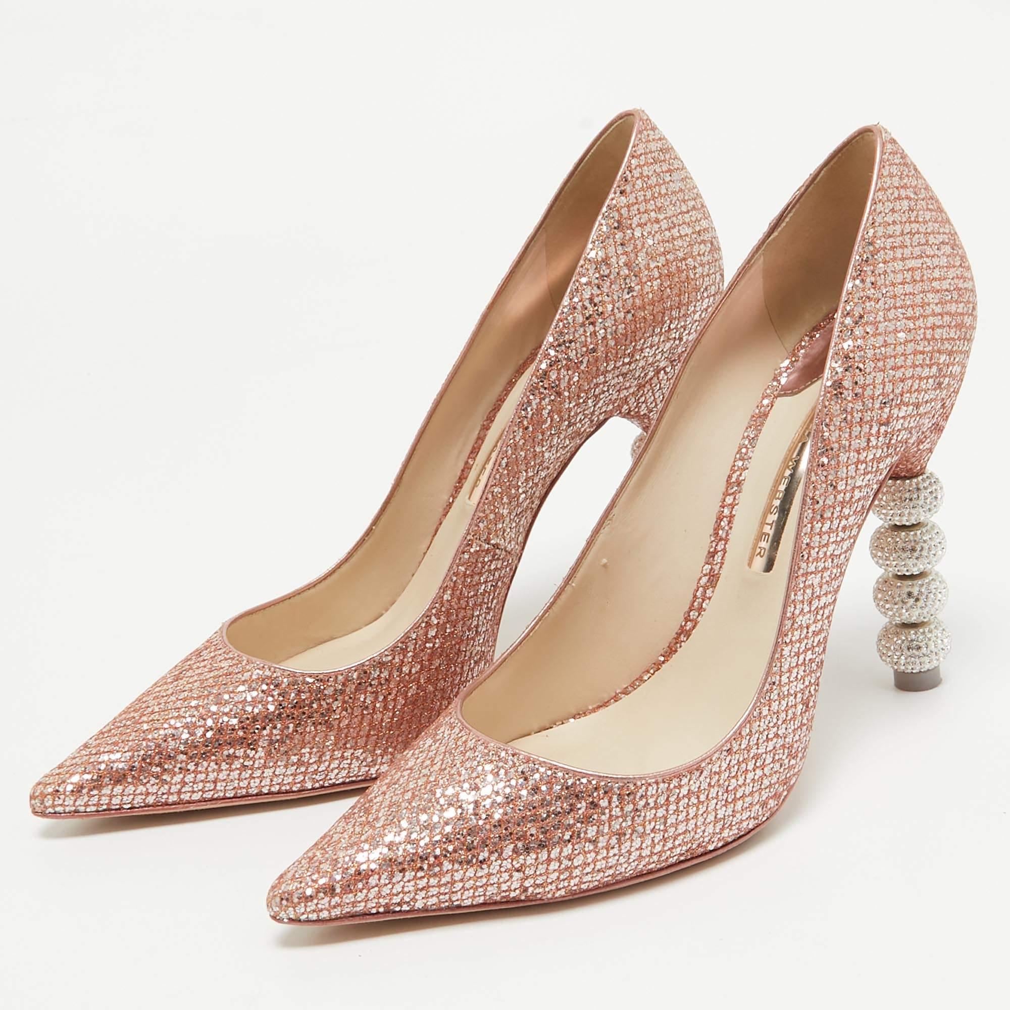 Make a chic style statement with these Sophia Webster glitter pumps. They showcase sturdy heels and durable soles perfect for your fashionable outings