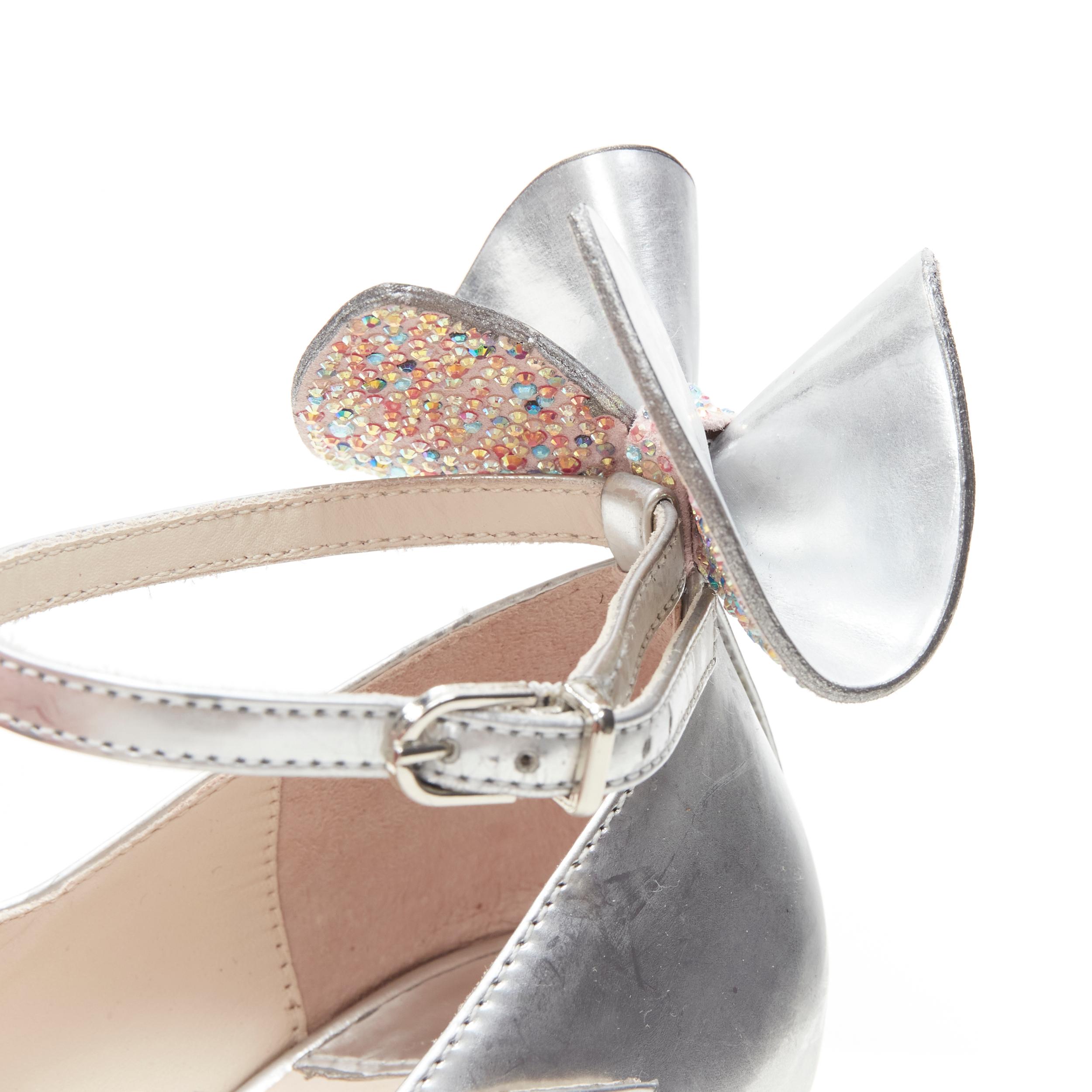 SOPHIA WEBSTER metallic silver crystal encrusted butterfly maryjane heel EU37 
Reference: ANWU/A00182 
Brand: Sophia Webster 
Material: Leather 
Color: Silver 
Pattern: Solid 
Closure: Buckle 
Extra Detail: Mirrored silver leather. Ankle strap.
