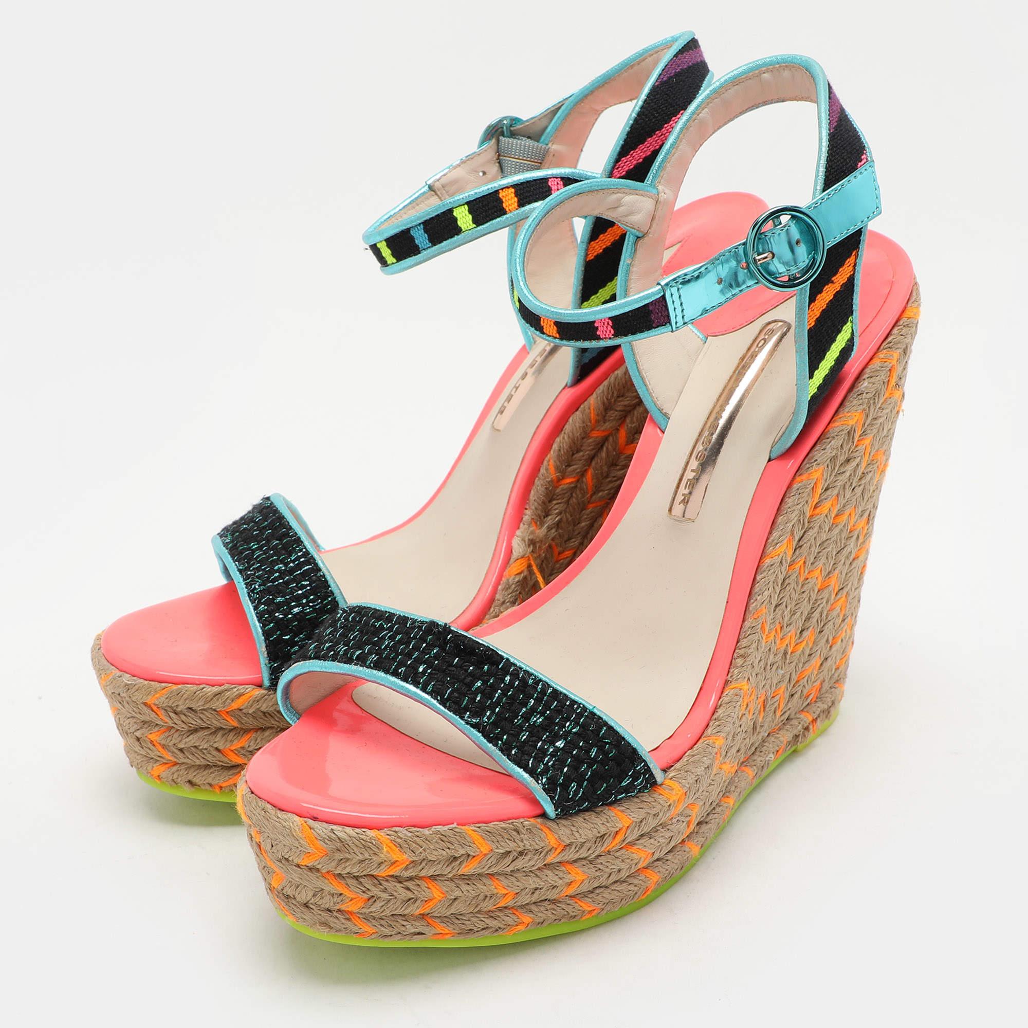 Youll love walking in these vibrant Lucita sandals from Sophia Webster that are perfect for your fashionable outings. These multicolor sandals are crafted from fabric and leather and feature an open toe silhouette. They flaunt single vamp straps and