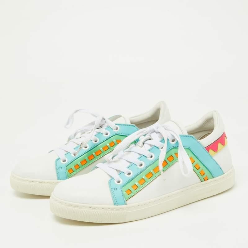 Elevate your footwear game with these Sophia Webster sneakers. Combining high end aesthetics and unmatched comfort these sneakers are a symbol of modern luxury and impeccable taste.