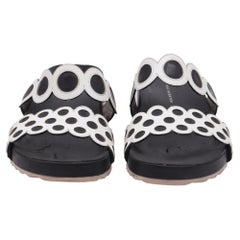 Sandali slip-on traforati di Sophia Webster in pelle bianca e nera