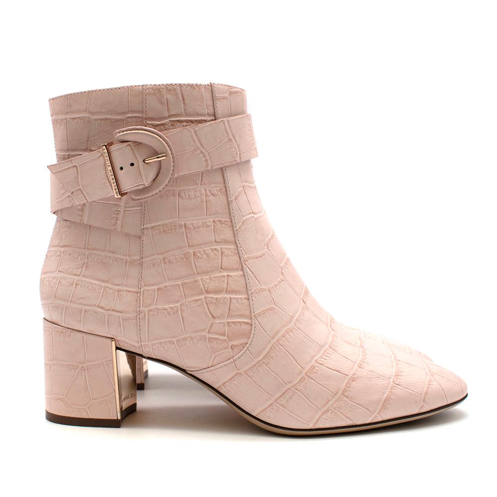 Sophia Webster Pink Croc Embossed Tutti 60 Ankle Boots

-Classic design in a beautiful light pink shade 
-Buckle fastening detail to the top 
-Gold rose hardware 
-Zip fastening to the side 
-Rubber inserts on the soles for adherence 
-Soft leather